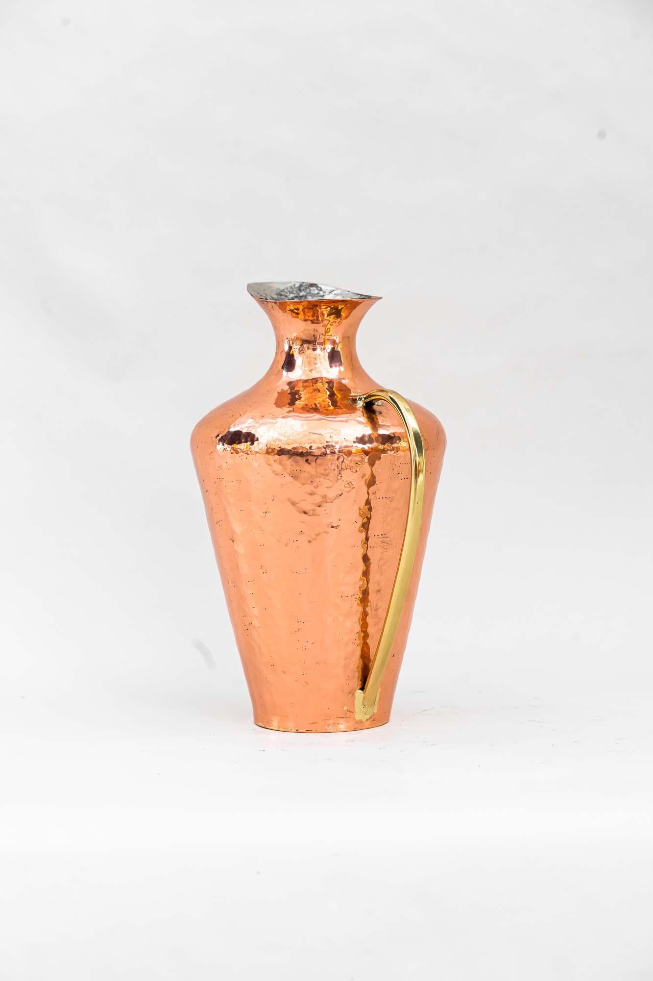 copper, brass hammered Jug around 1950s
Polished and stove enameled.