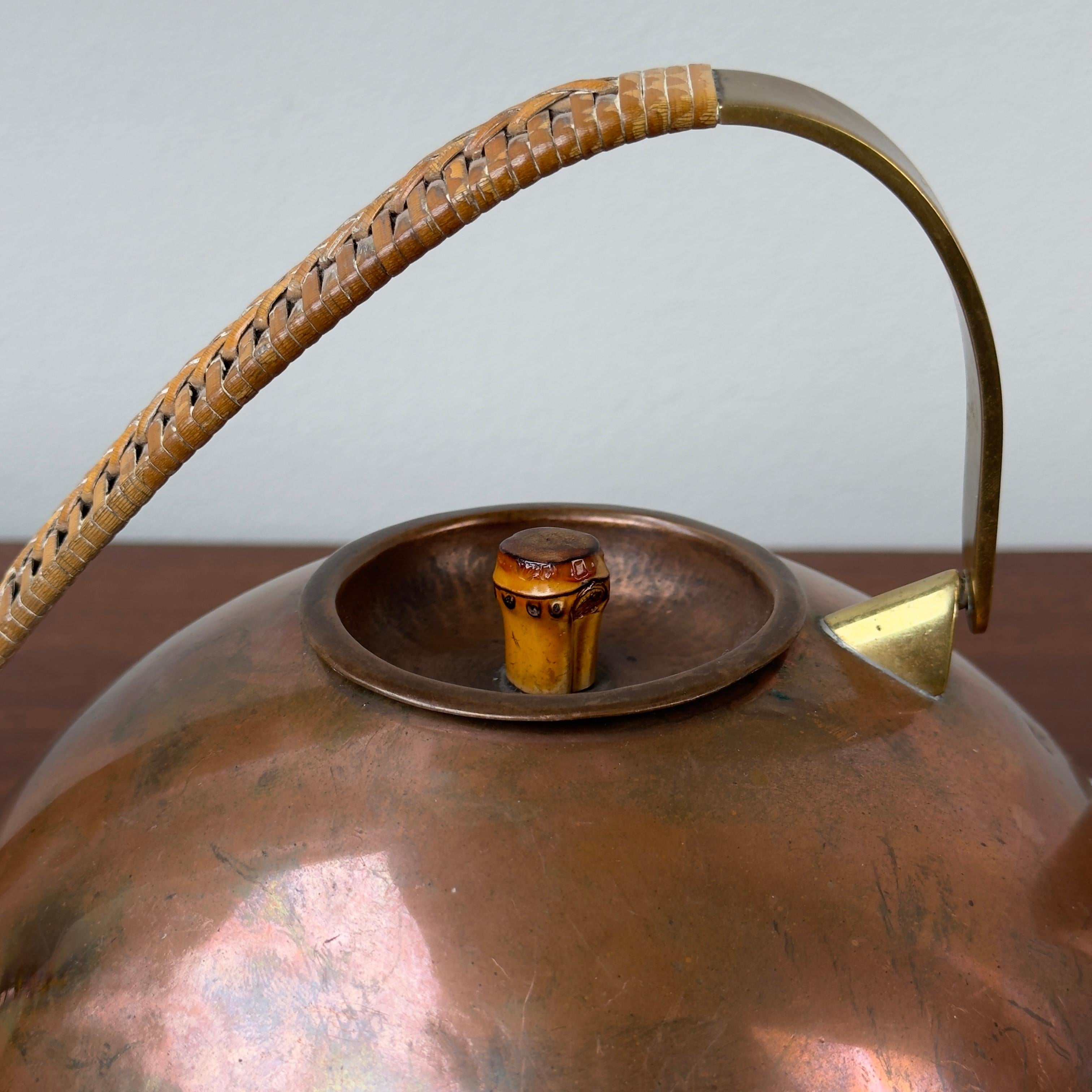 Mid-20th Century Copper, Brass & Wicker Teapot, Carl Auböck II, 1950s For Sale