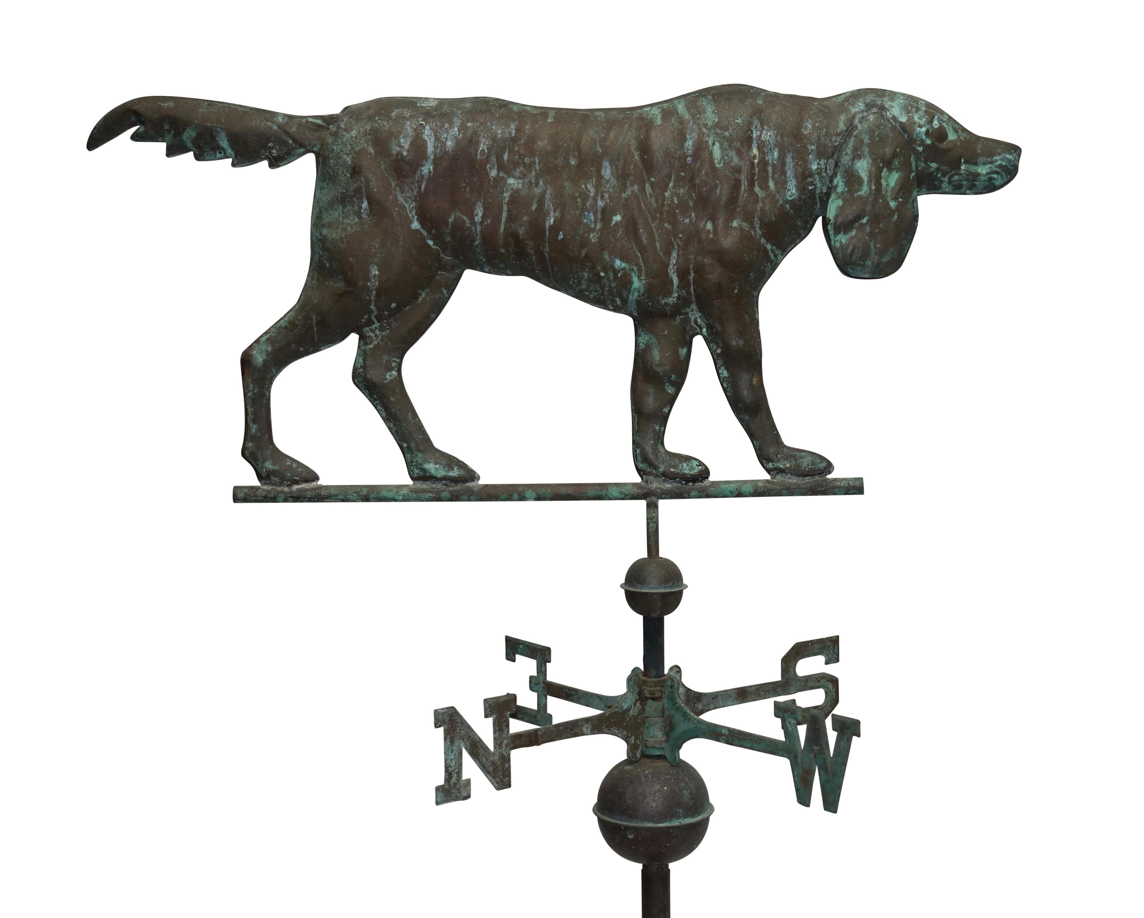 Copper dog weather vane with copper or bronze cardinal, American, 19th-early 20th century.