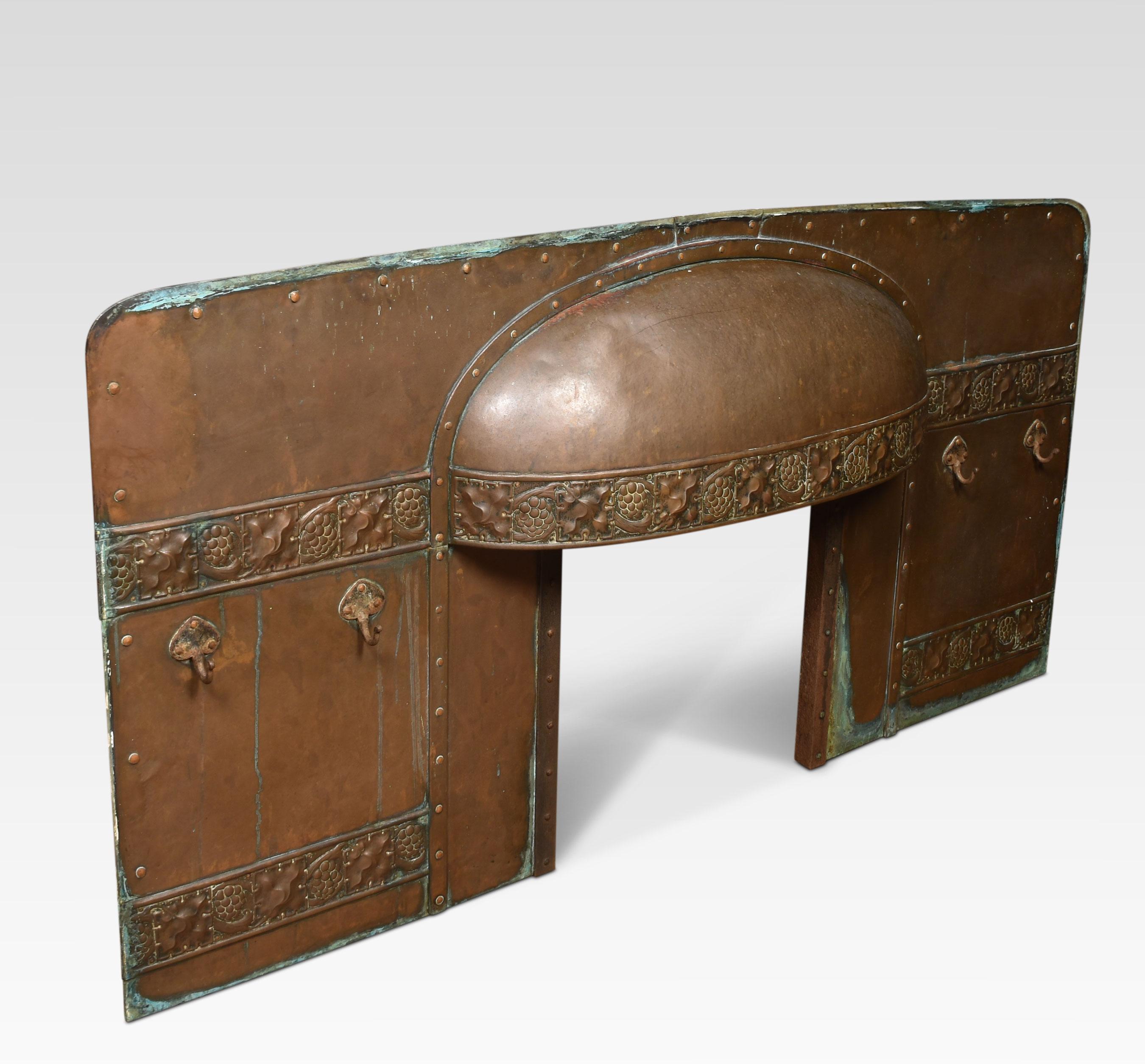 19th-century copper fire surrounds the domed centre above strap work embossed foliated decoration.
Dimensions
Height 36 inches
Width 73.5 inches
Depth 7.5 inches

Internal measurements
Height 22.5 inches
Width 21 inches.