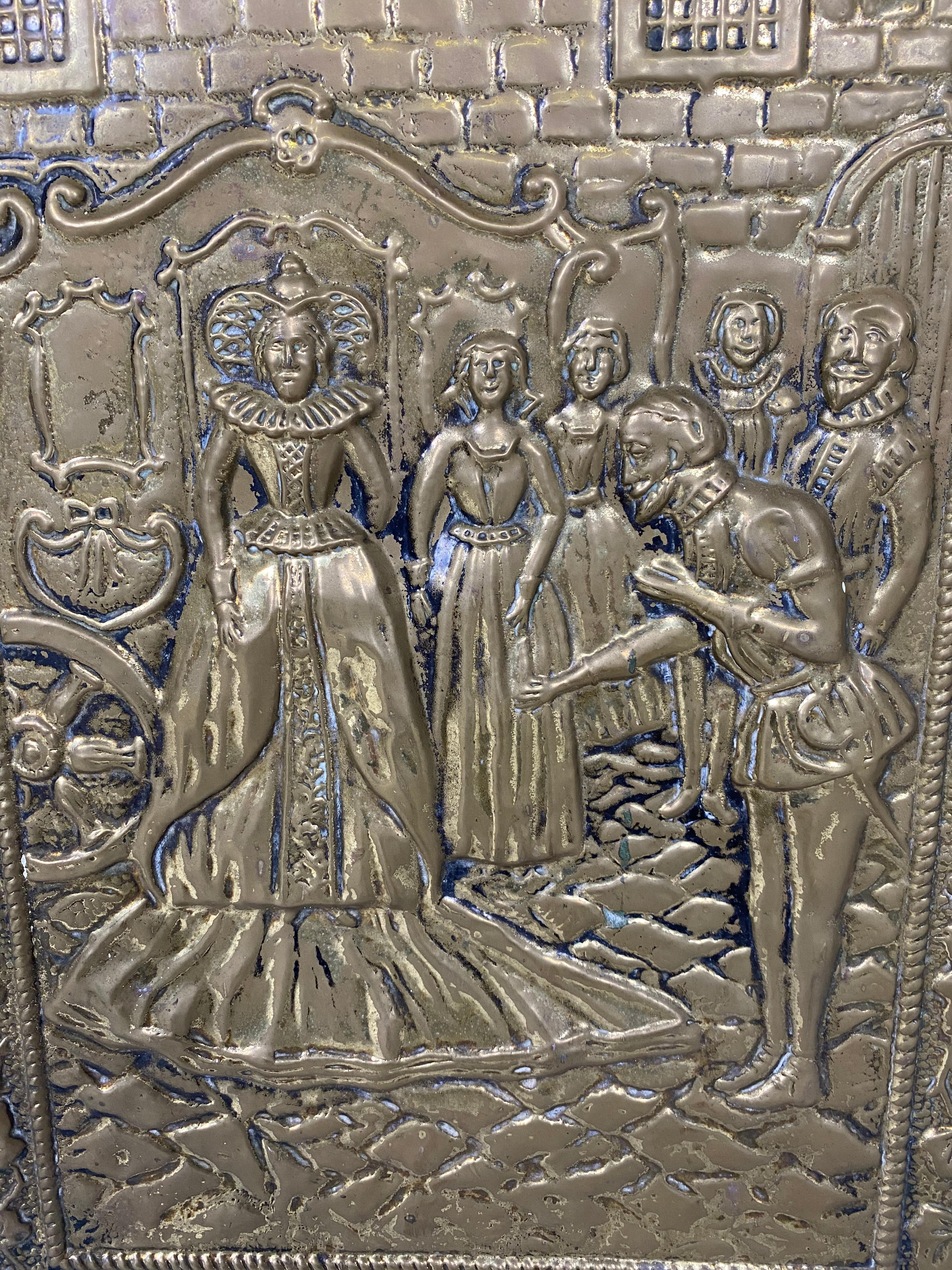 Copper embossed fire screen with an image of the Scottish Court with an ivy setting in an art nouveau style.

Measurements: Height 56 cm, width 33 cm, depth 16 cm.