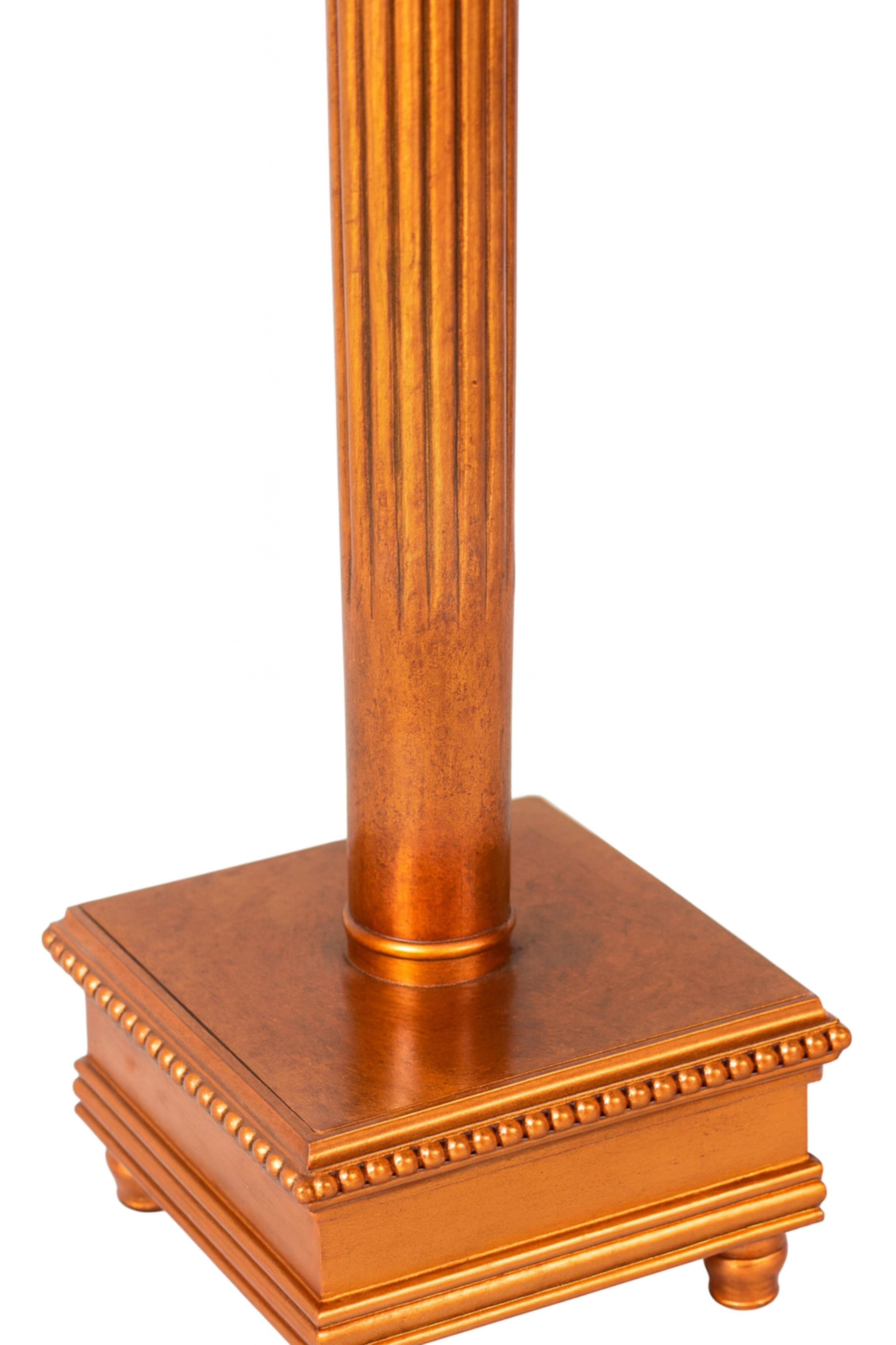 This exquisite hand-carved wooden column, adorned with a refinished copper gilt, exudes timeless elegance and grandeur. 
Standing at an impressive 43.9 inches (111.5 cm) tall, the column features a refined silhouette with a 10.2-inch (26 cm)
