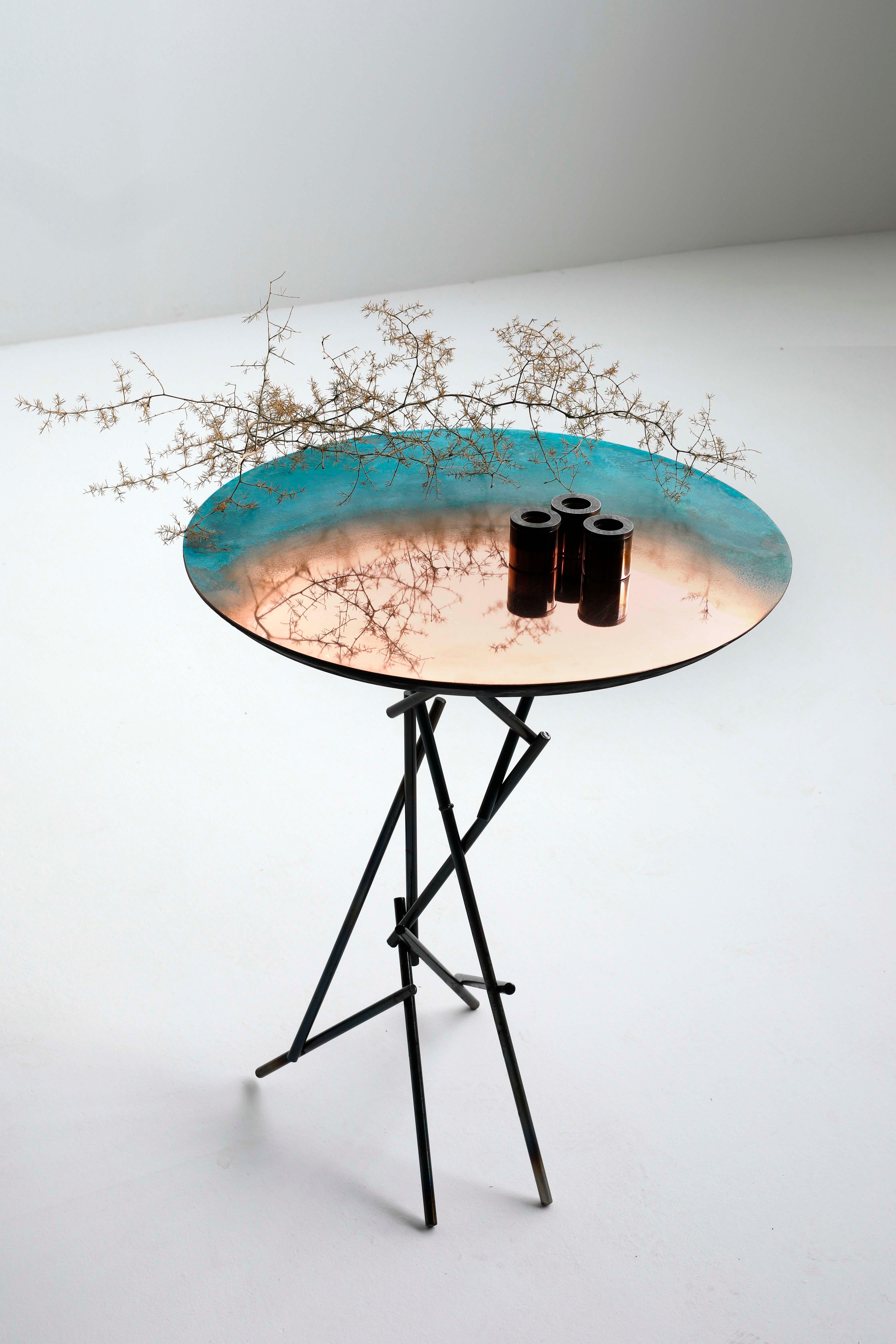 Copper hand-sculpted side table by Samuel Costantini
Entirely handmade by the artist, each one is unique.
Measures: Diameter 500mm, height 550 mm.
Diameter 19.685, height 21.653 inches
Cylindrical table with oxidized copper top and black