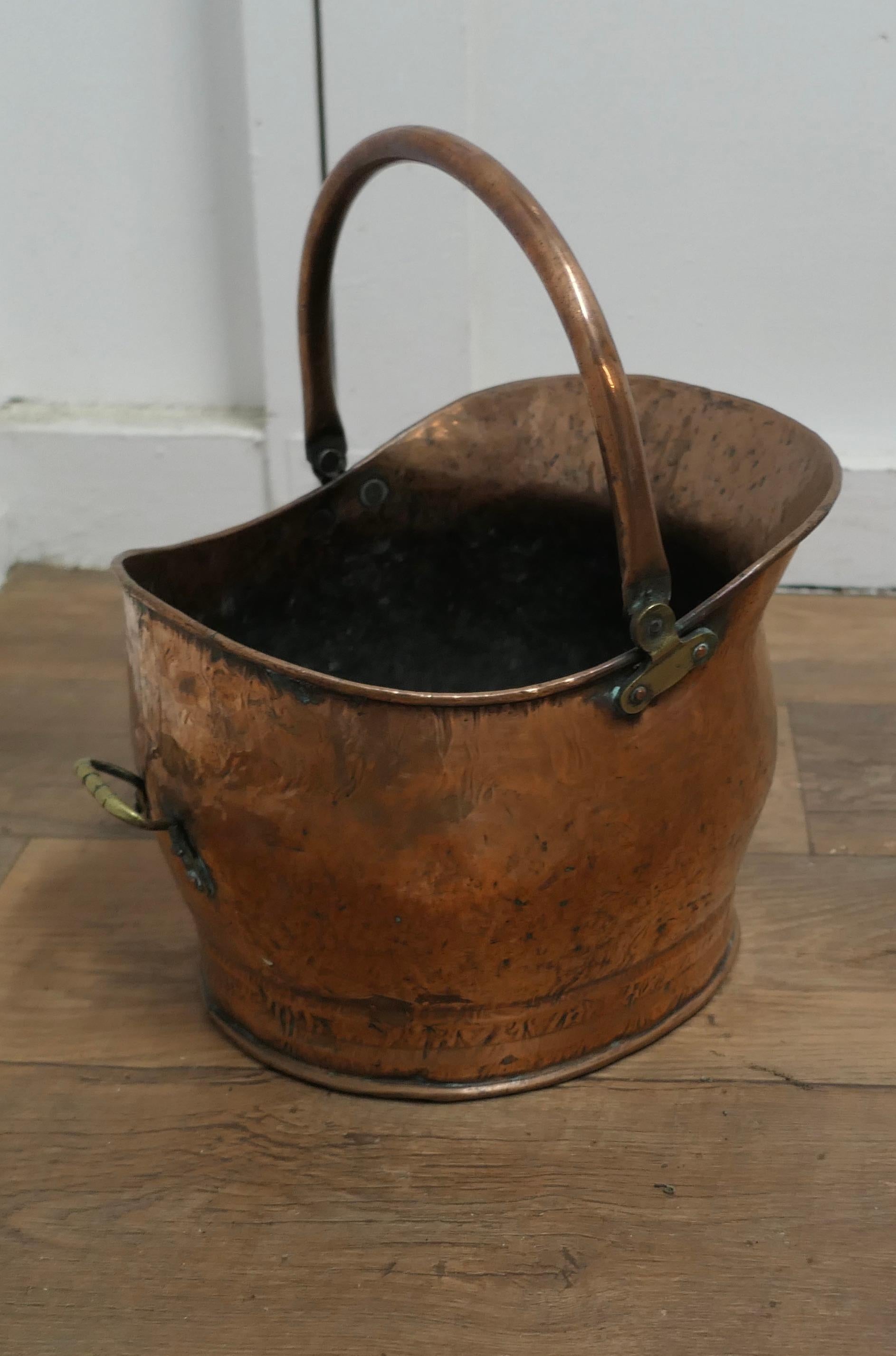Arts and Crafts Copper Helmet Coal Scuttle   This bucket is a very attractive helmet shape  For Sale