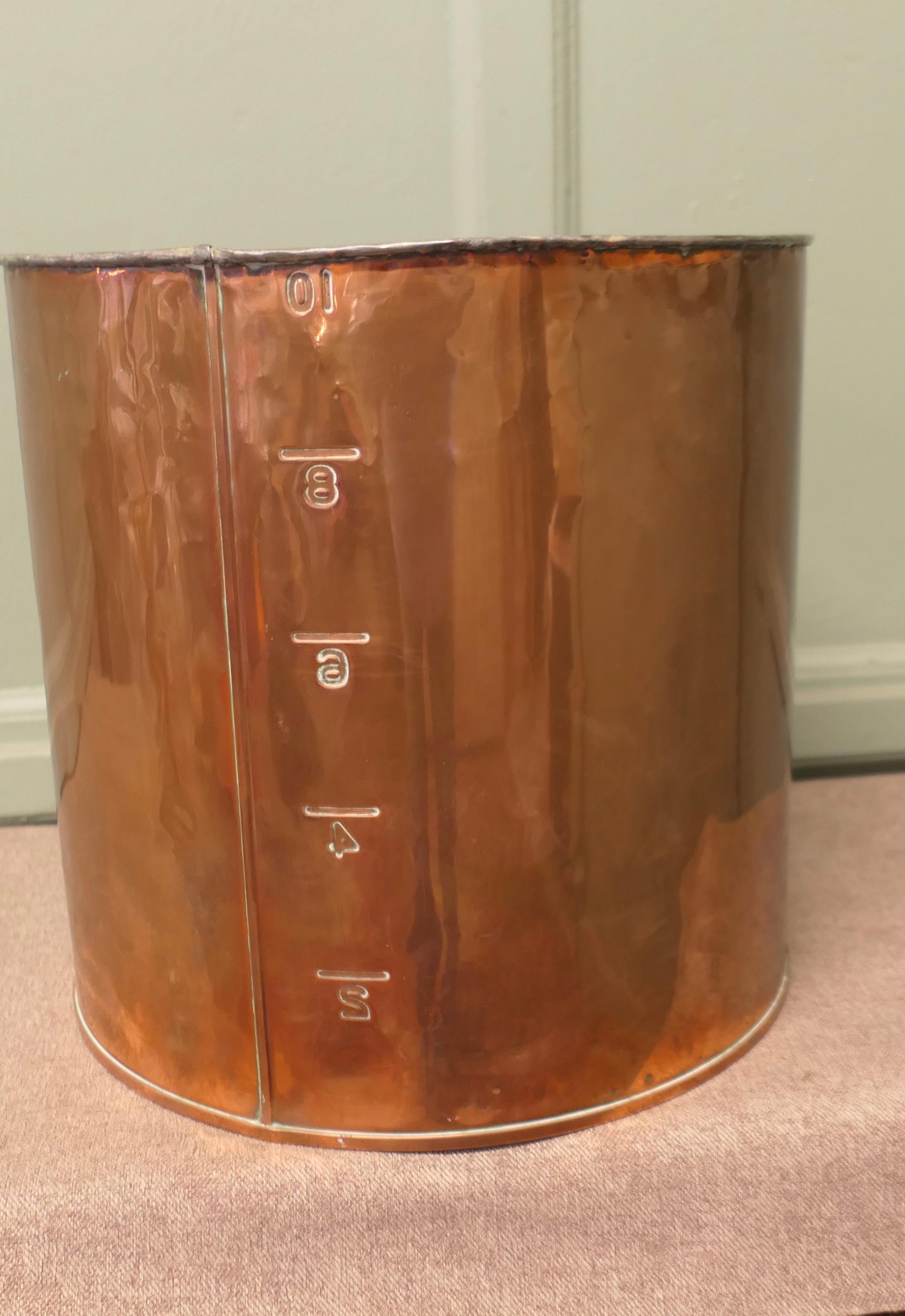 Copper Hot Water Filter, Log Bin

This very practical piece has been tinned inside the Copper body with with numbered scale on the side and holes pierced in the bottom, it is probably an ancient kitchen piece 
In good clean condition, decorative,
