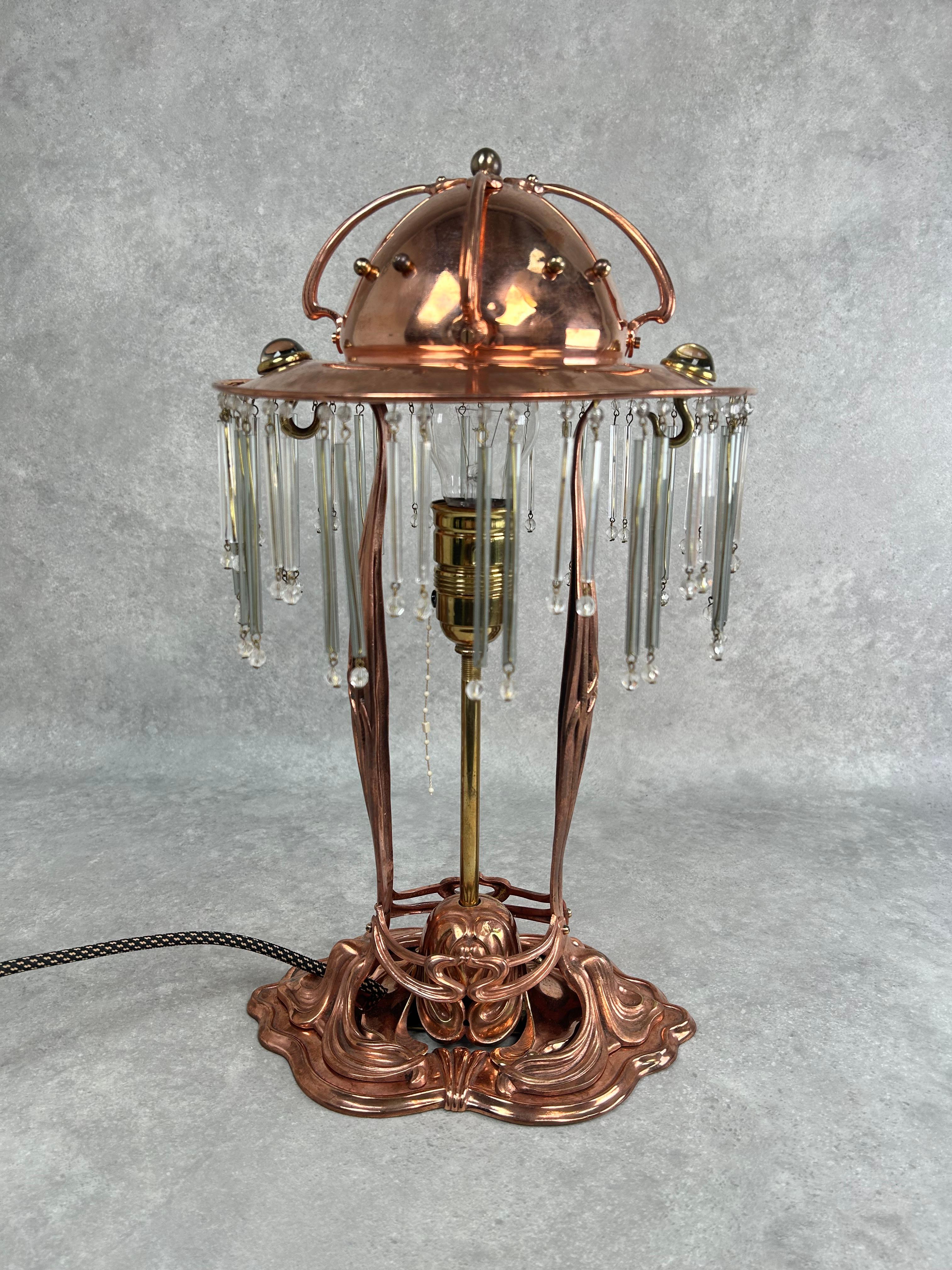 Copper jugendstil table lamp with glass crystals. Professionally stained and repolished.