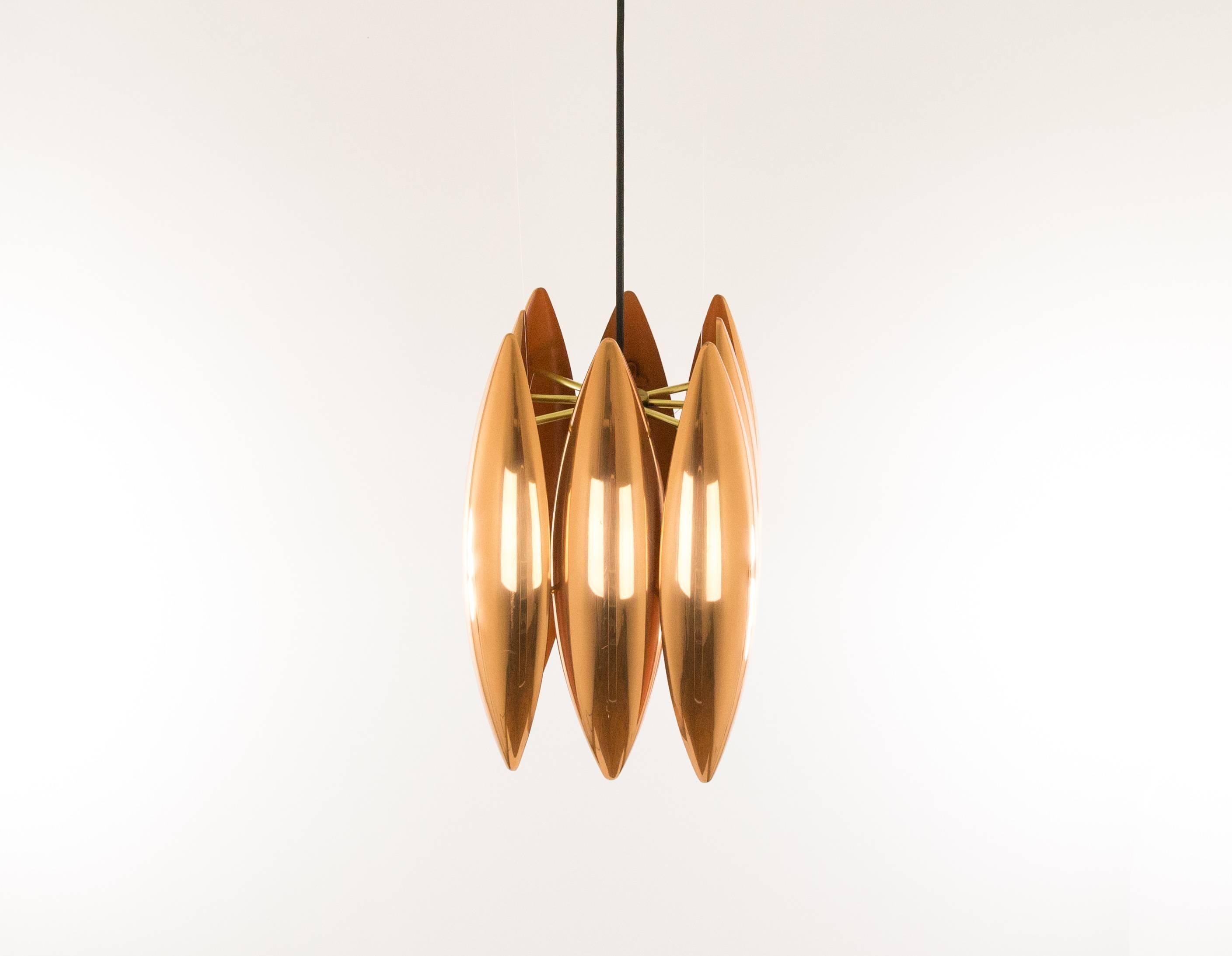 Jo Hammerborg designed the 'Kastor' pendant for Danish manufacturer Fog & Mørup.

The 'Kastor' series consisted of three different models: a pendant, a wall lamp and a floor lamp, all executed in solid copper or brass. The striking brass models