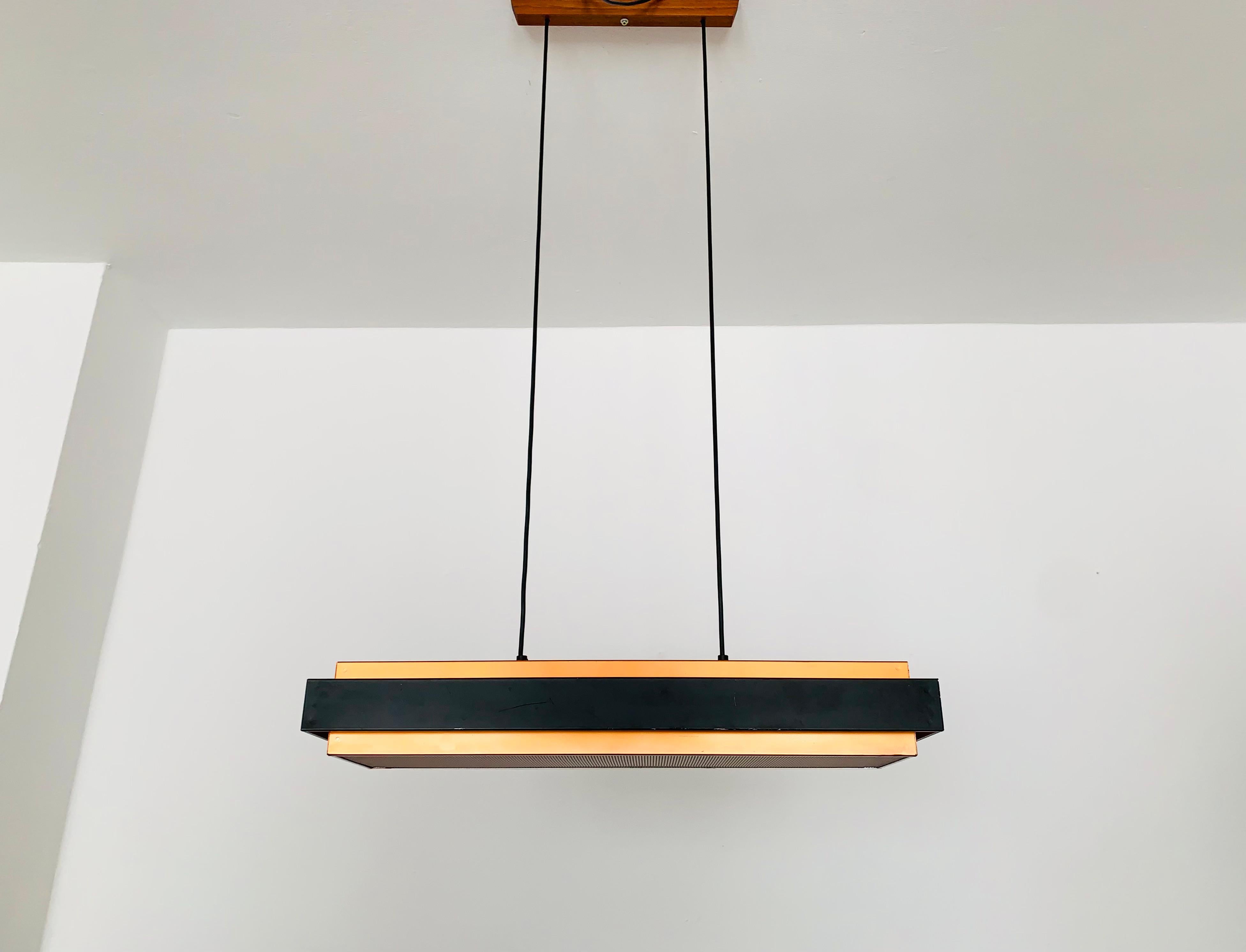 Very beautiful and impressive pendant lamp from the 1960s.
Contemporary design and a highlight for every room.
A cozy light is created.

Manufacturer: Fog and Morup
Design: Jo Hammerborg

Condition:

Very good vintage condition with slight