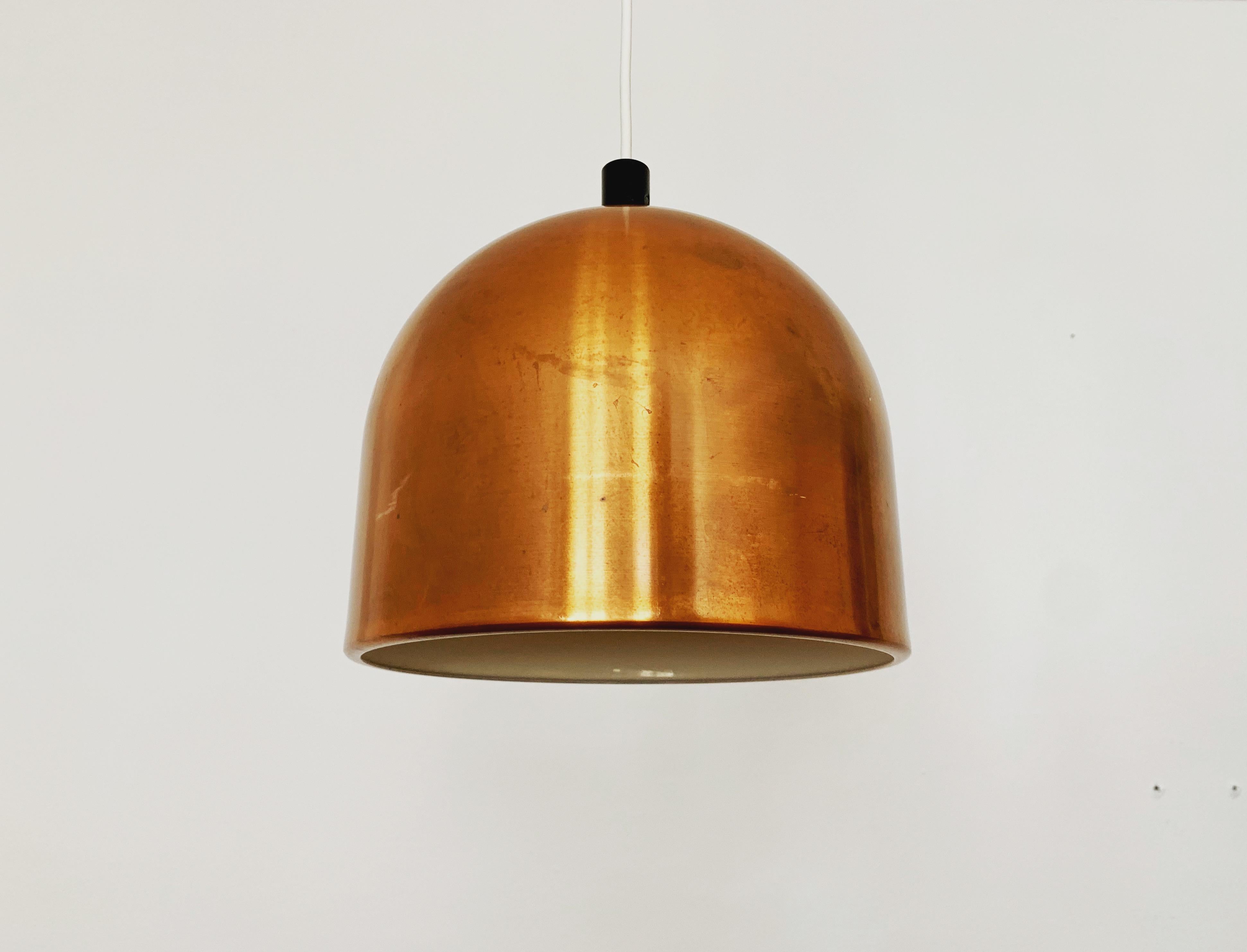Wonderful Danish pendant lamp from the 1960s.
The very contemporary design creates a cozy atmosphere and gives off a nice warm light.
The holes in the lampshade create a very pleasant play of light on the ceiling.

Condition:

Very good