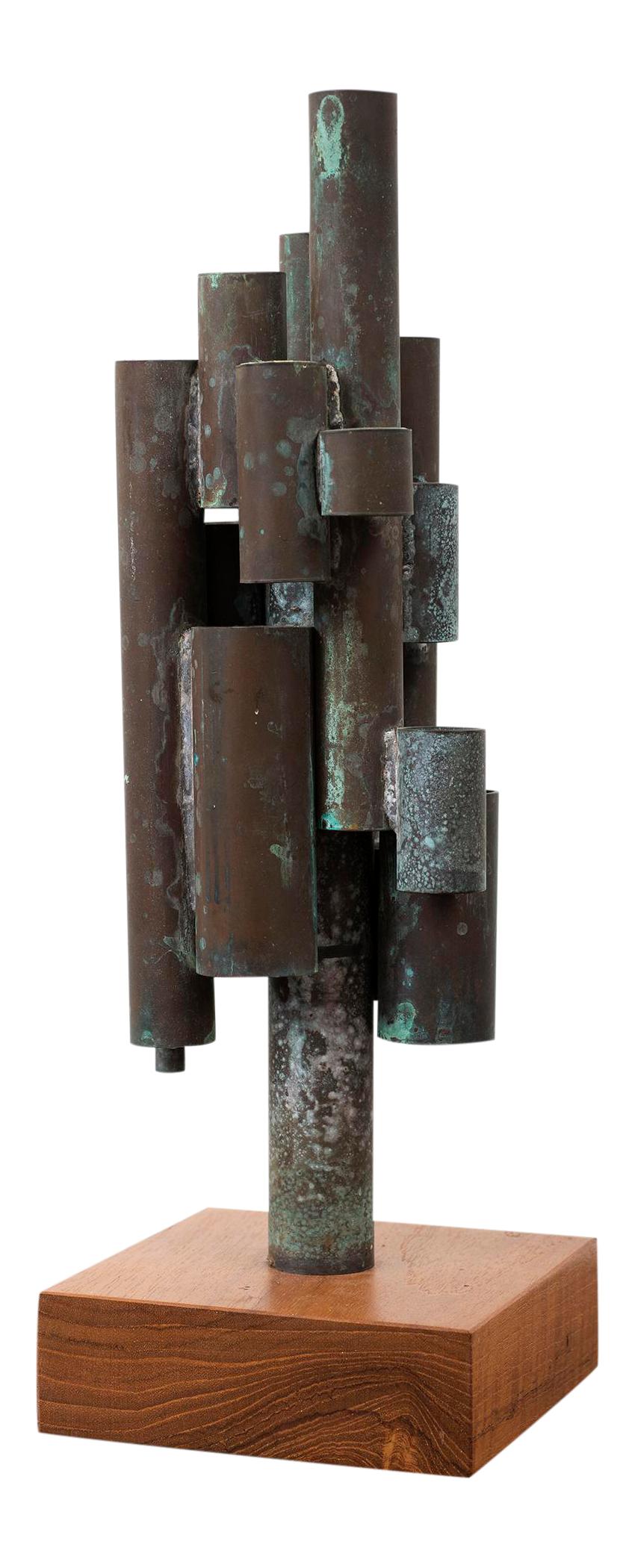 Brutalist table sculpture of copper tubing with lovely patina. Mounted on a solid wood base. Made in the 1960s by California artist Josef Hoffmann.