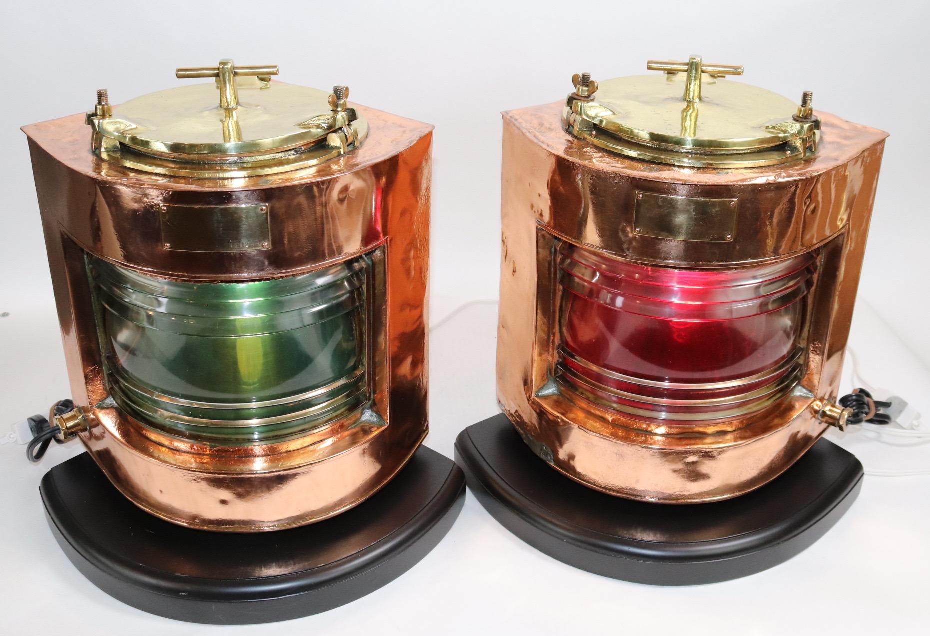 Polished and lacquered ships port and starboard lanterns mounted to thick custom wood bases. With clear glass fresnel lenses, removable red and green filters. Both have been electrified for home display. Weight is 50 pounds.