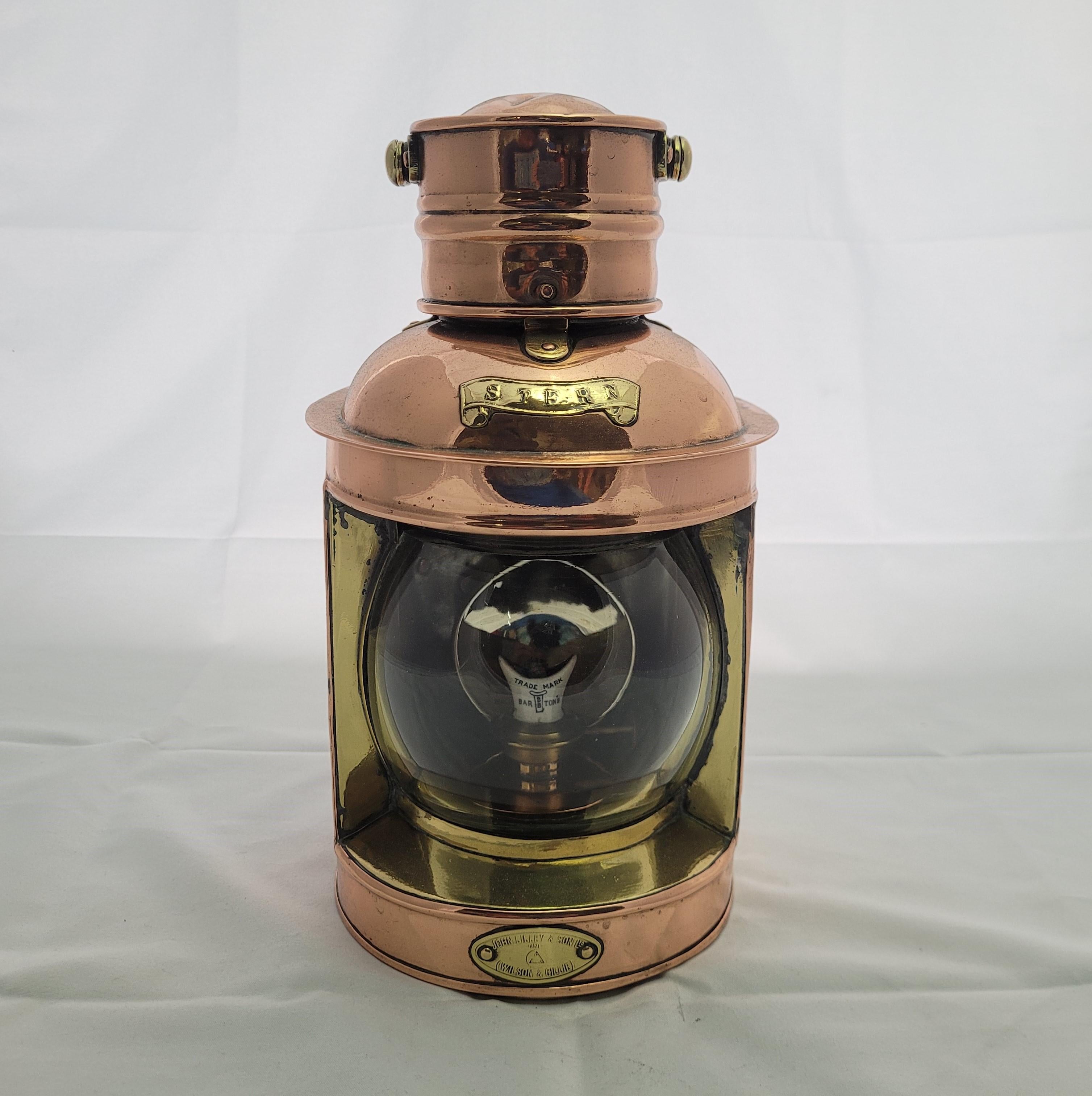 Highly polished copper and brass trimmed ships lantern with glass lens, Brass 