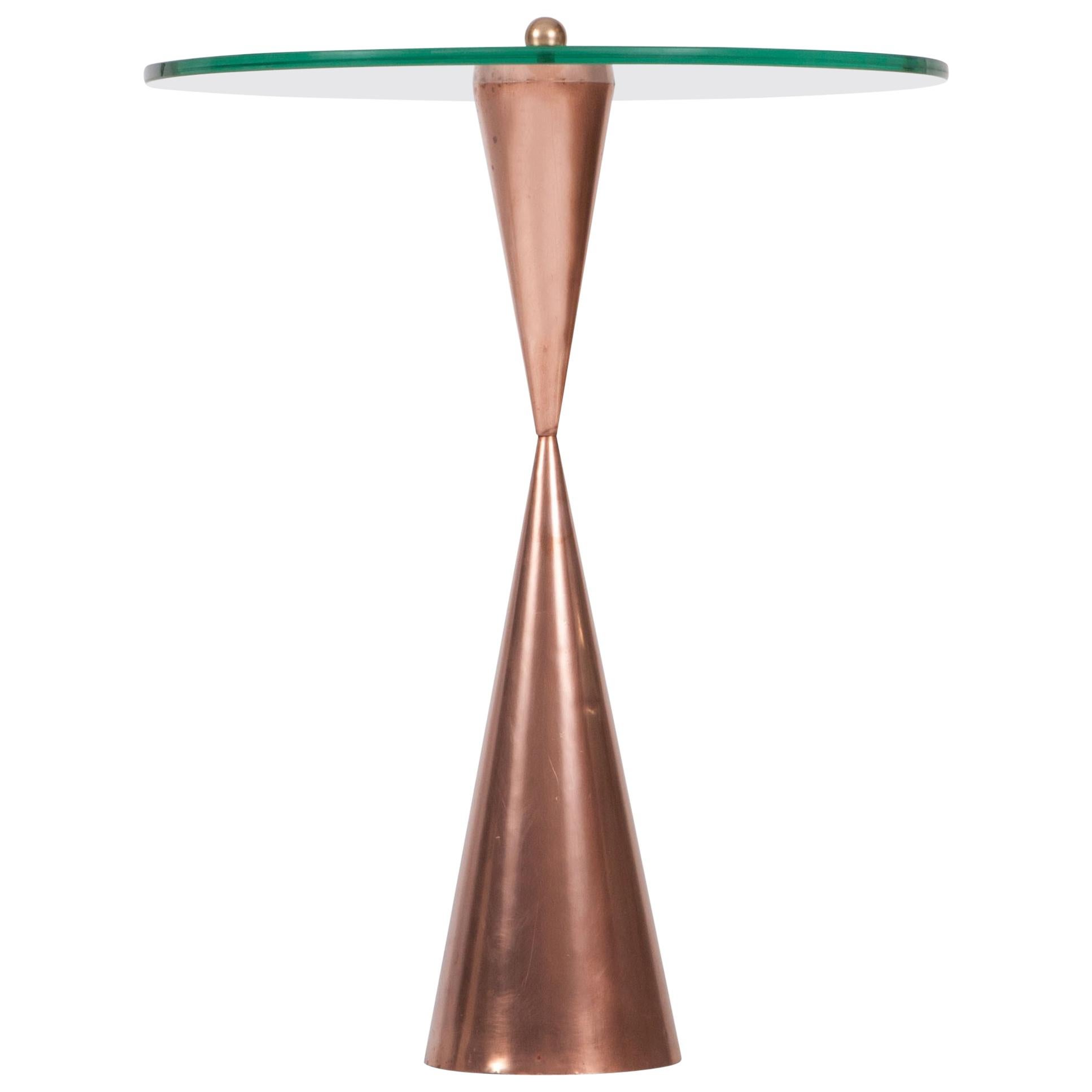 Postmodern copper side table with round glass top, Italy, 1980s

Would fit well in a Mangiarotti or Sottsass inspired interior.


 