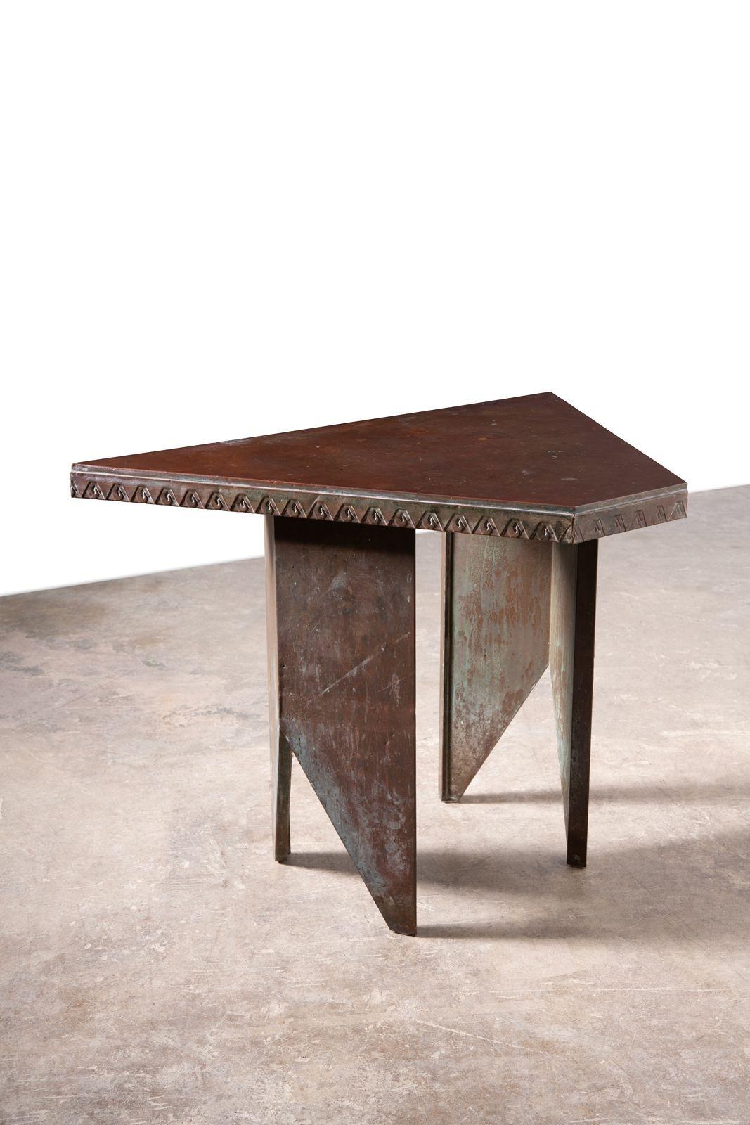 Table, copper and wood from Price Tower designed by Frank Lloyd Wright, 1956. The table showcase the Japanese influence present throughout Wright’s career and has a beautiful patina featuring the same patinated copper as the exterior panels of the
