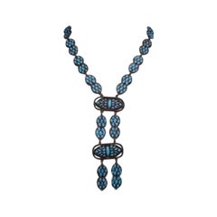 Collier en métal de couleur cuivre et pâte de verre turquoise, années 1925