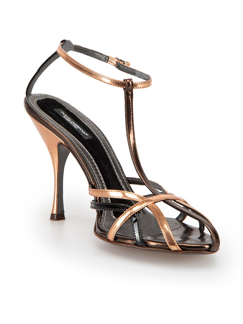 CONDITION is Very good. Hardly any visible wear to heeled sandals is evident on this used Dolce & Gabbana designer resale item. Original box and dust bag are included.



Details


Metallic copper and black

Patent leather 

High heeled