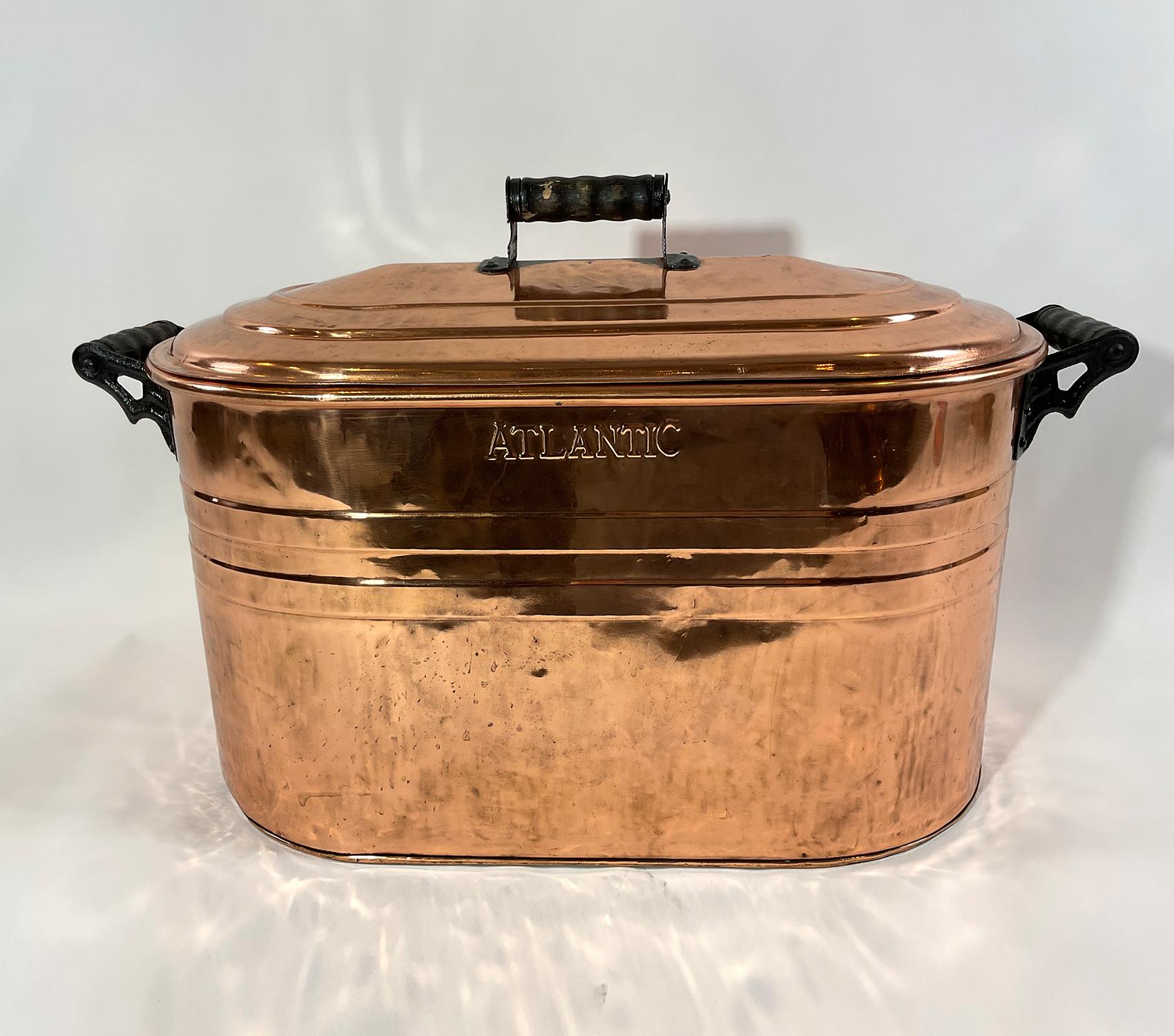Polished and lacquered copper bin embossed 
