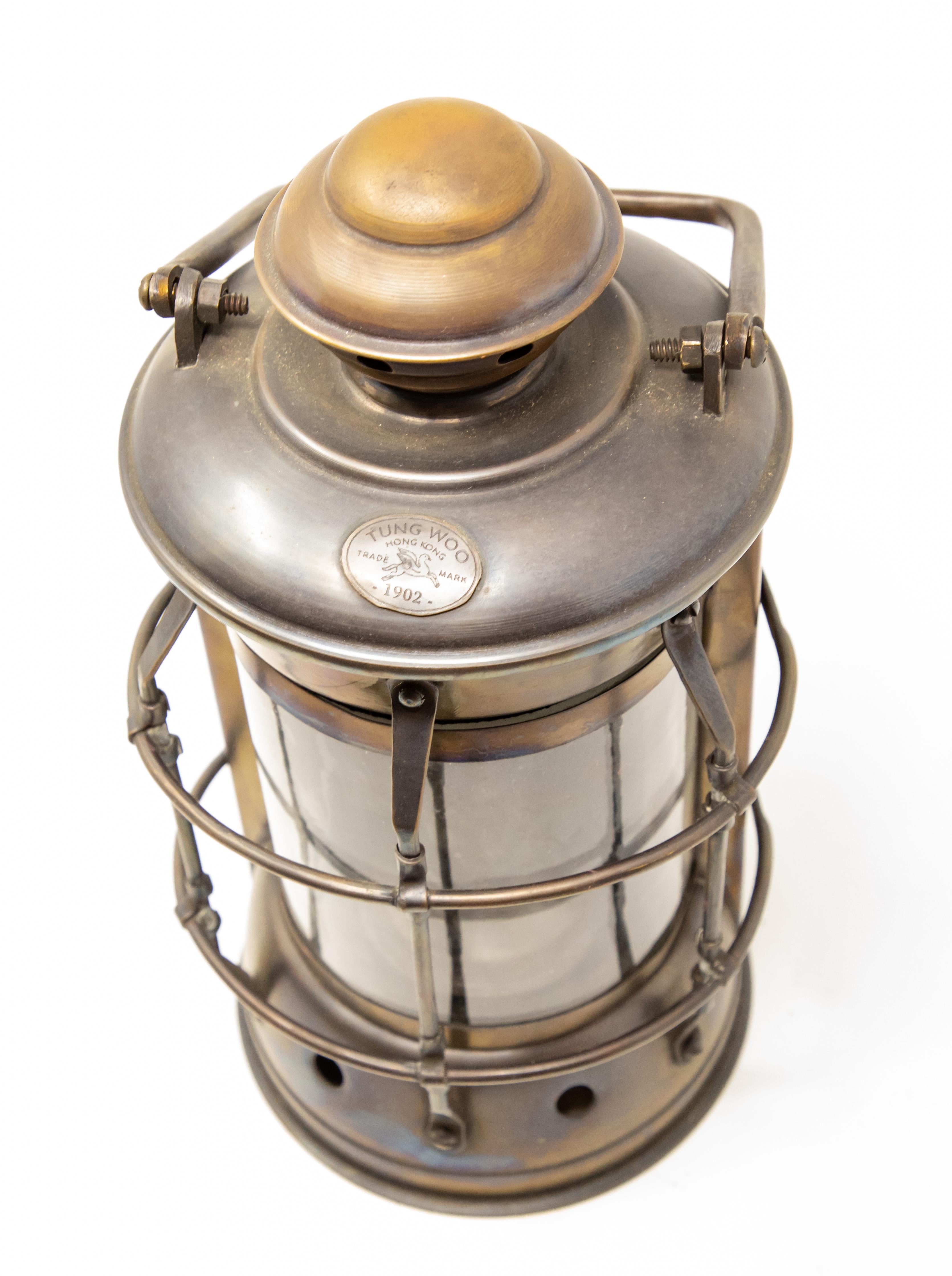 Offering this ship lantern by Tung Woo out of Hong Kong. Gorgeous aging to the copper make for the rustic look of the lantern.