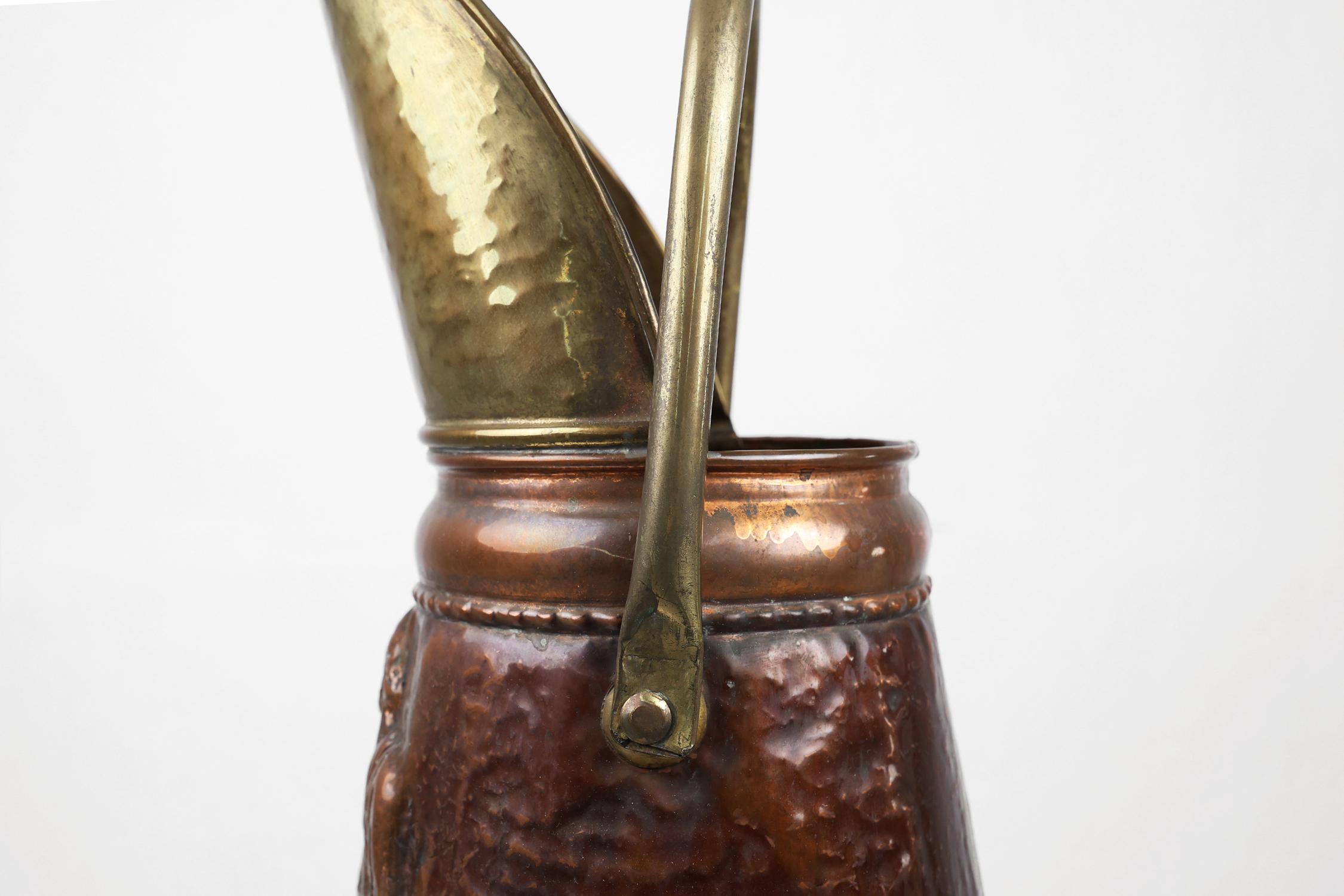 Early 20th Century Copper umbrella stand with an embossed image medieval couple, France ca. 1900 For Sale