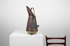 Copper umbrella stand with hammered relief of a medieval familie scene, France c