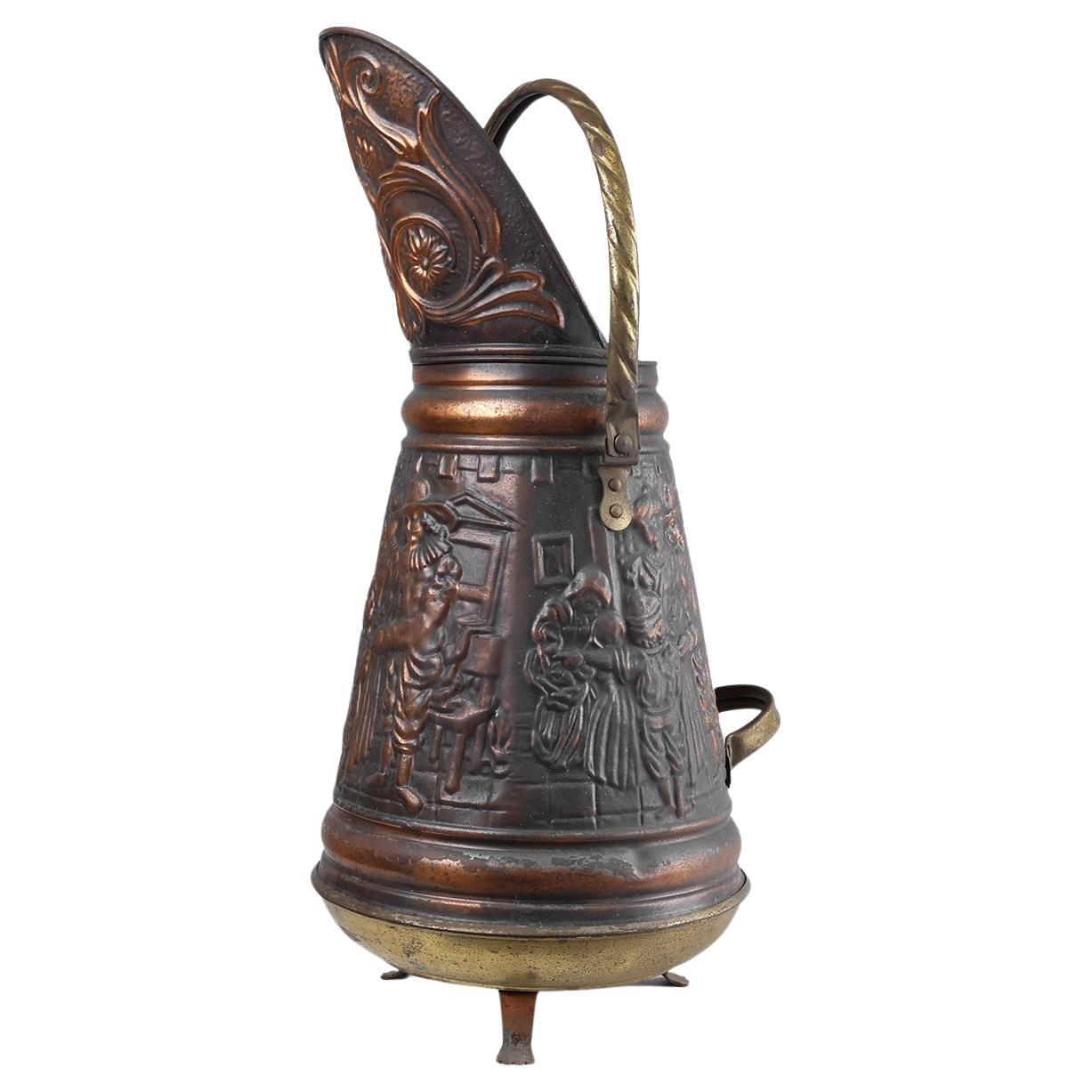 Copper umbrella stand with hammered relief of a medieval familie scene, France c