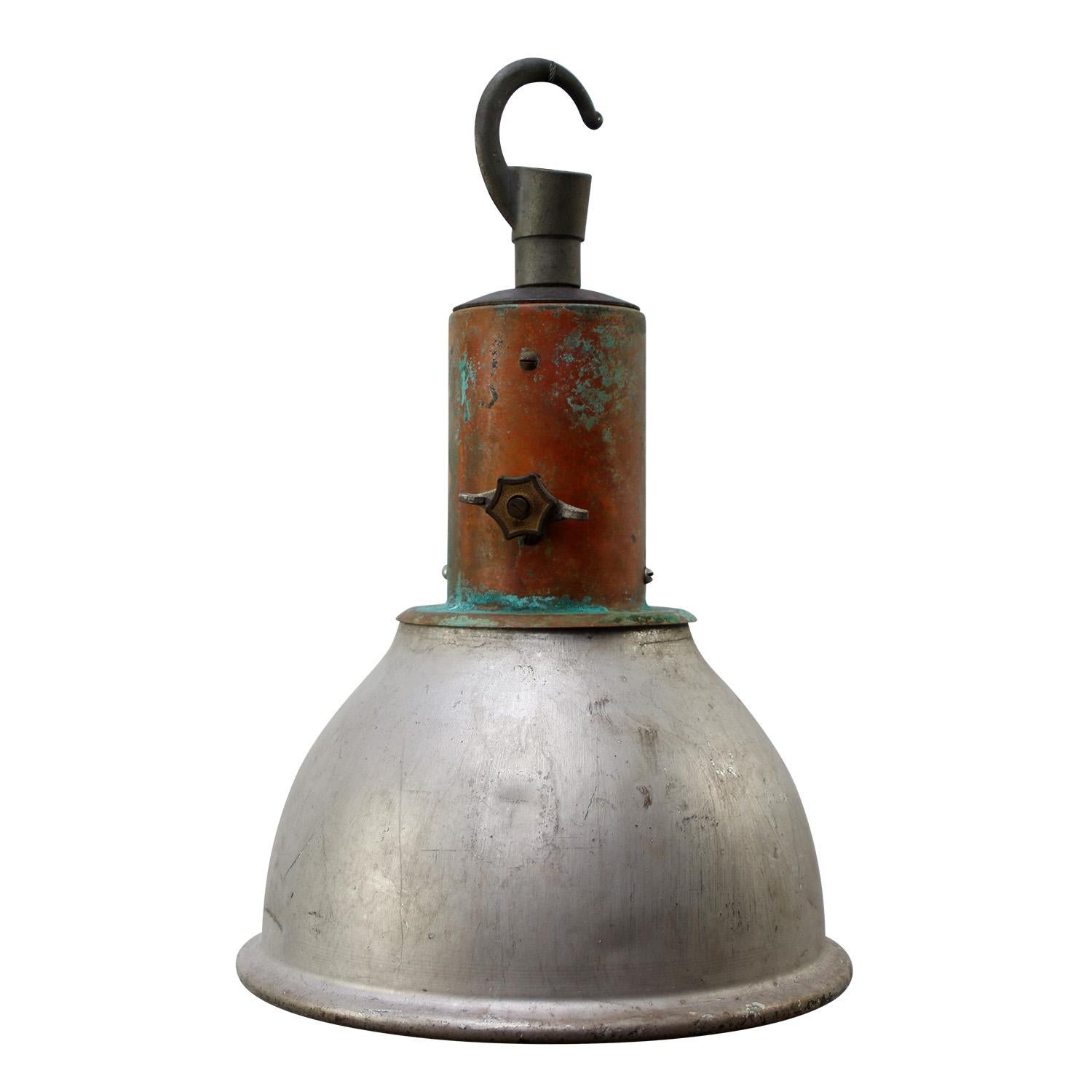 Industrial pendant lamp by Holophane Paris
Grey metal shade with clear striped / holophane glass
Copper top

Weight 2.40 kg / 5.3 lb

Priced per individual item. All lamps have been made suitable by international standards for incandescent light