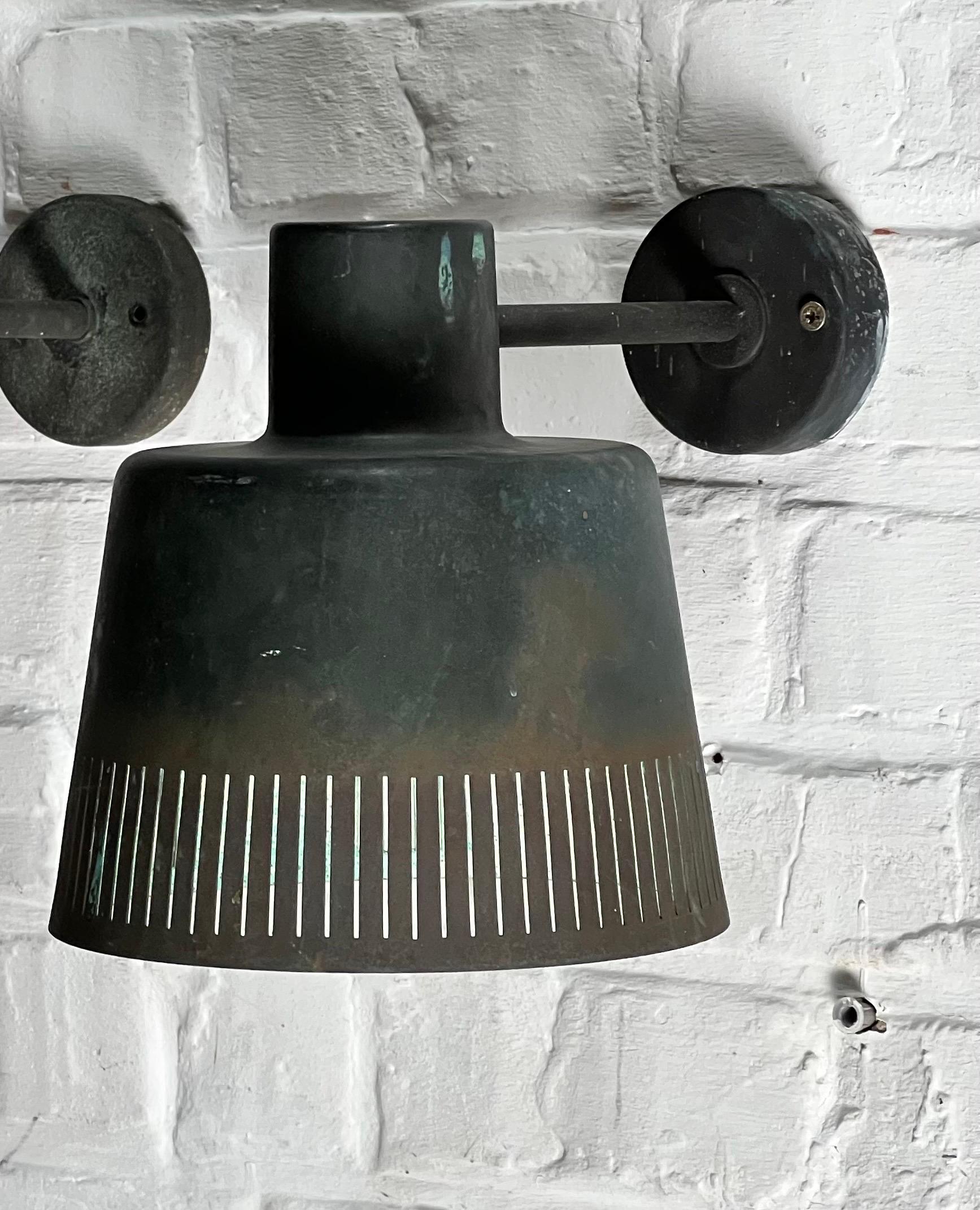 Rare copper lamp by Swedish architect and designer Hans Bergström. This is very hard to find. It can be used outside as it was used for 70 years but you can use it inside and it can be turned upside down as seen on the picture. The elegant openings