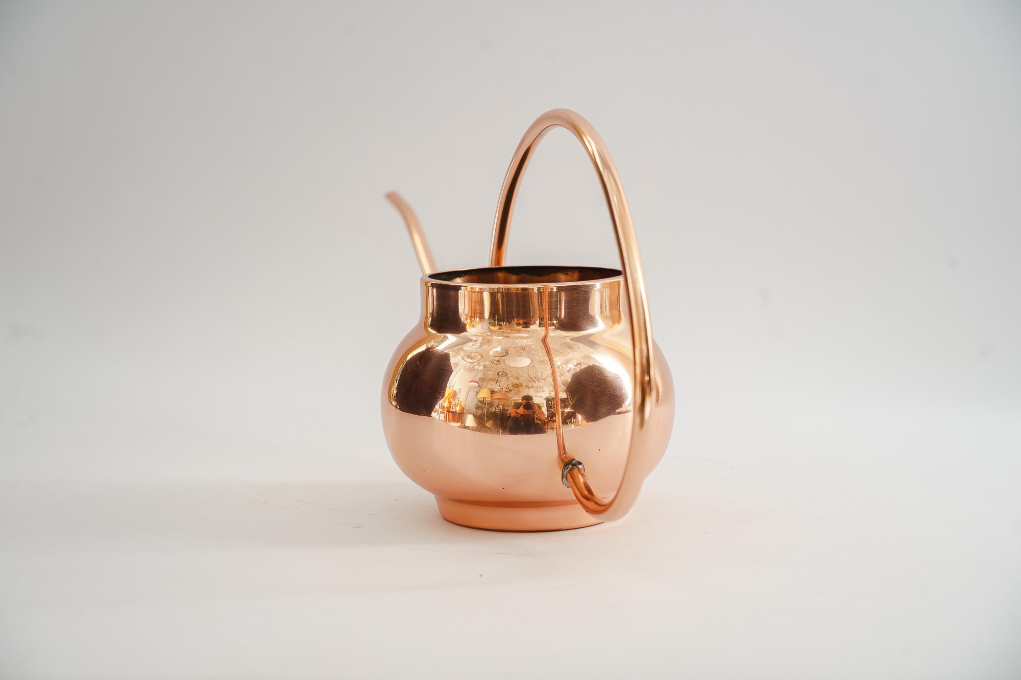 Copper watering can around 1950s
Polished and stove enameled.