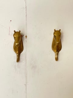 Pair of brass "Horsehead" coat racks - Italian elegance, 1970s