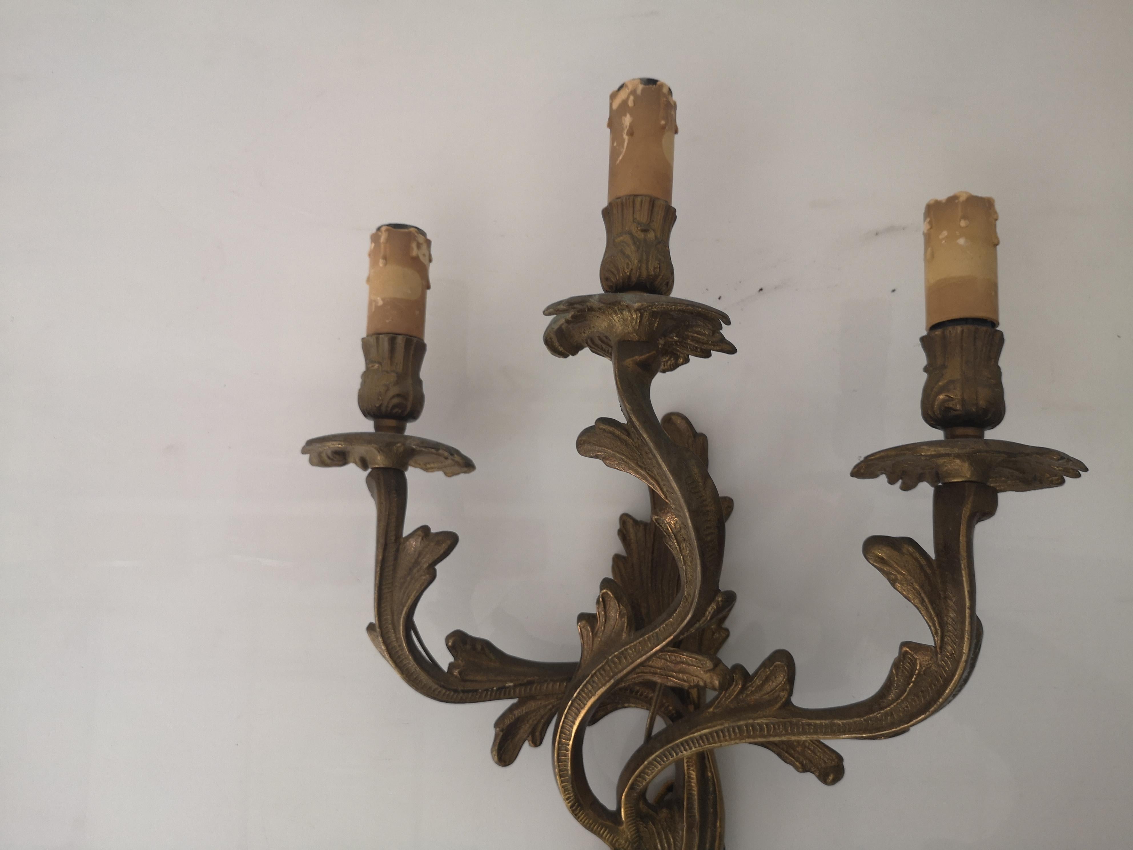 Bronze Pair of 3-light bronze wall sconces in Louis XV style 1940s For Sale