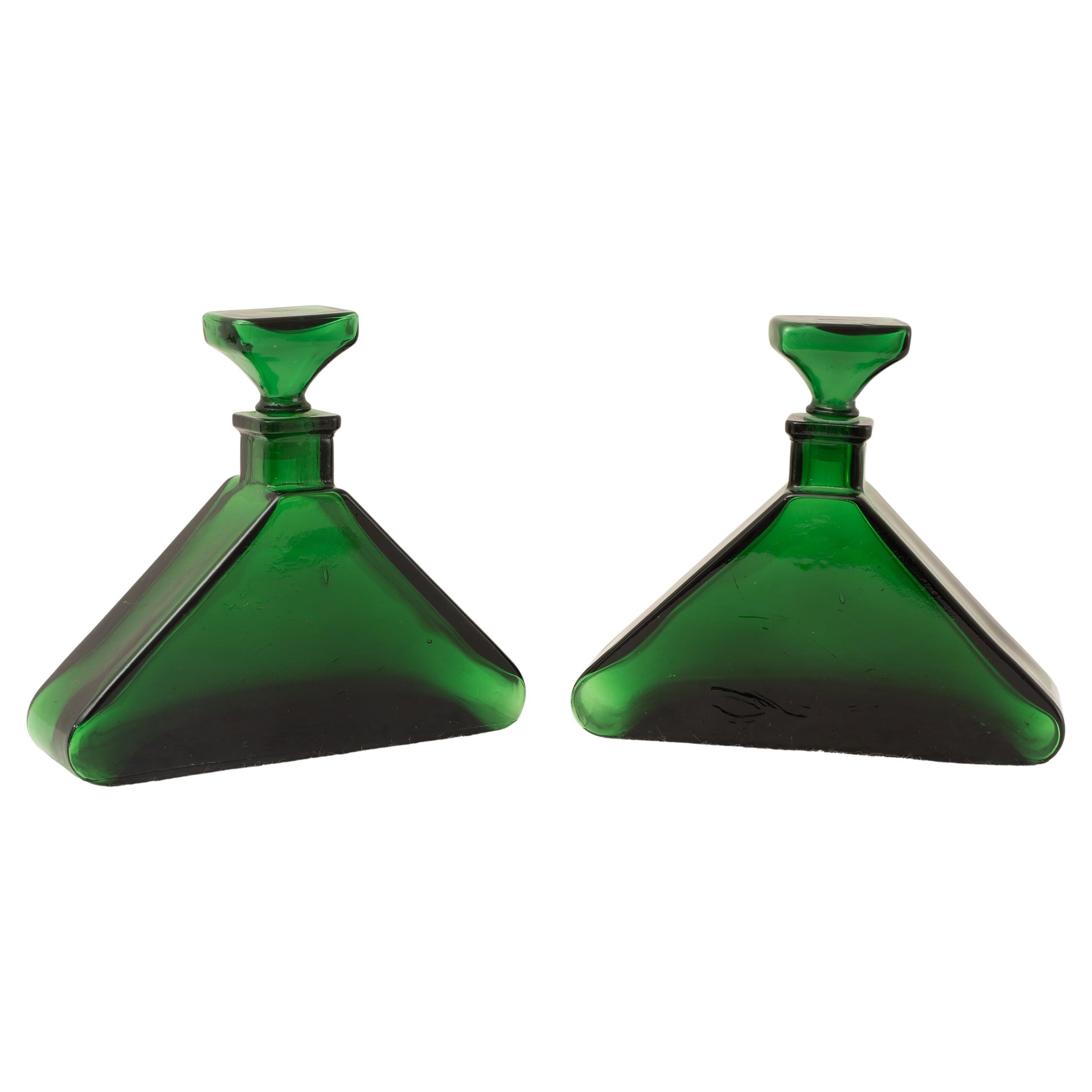 Pair of heavy glass furnishing bottles, 1970s