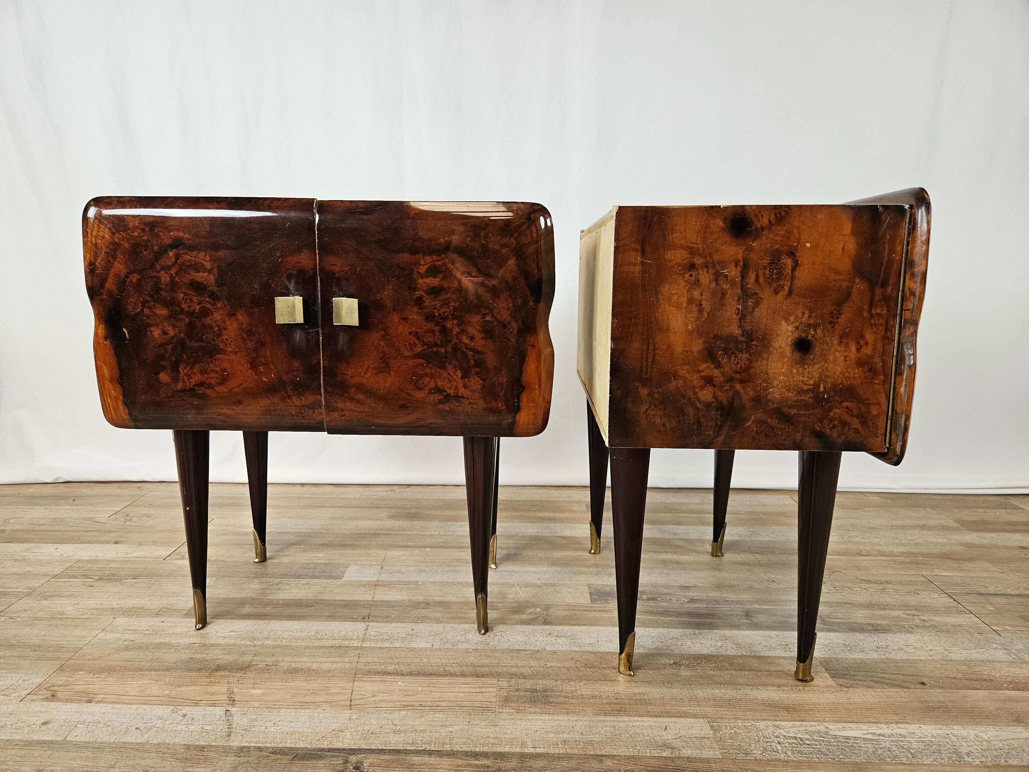 Pair of fine and elegant Mid Century Italian Design nightstands from the early 1950s.

They have a removable stained glass top where a printed trademark 