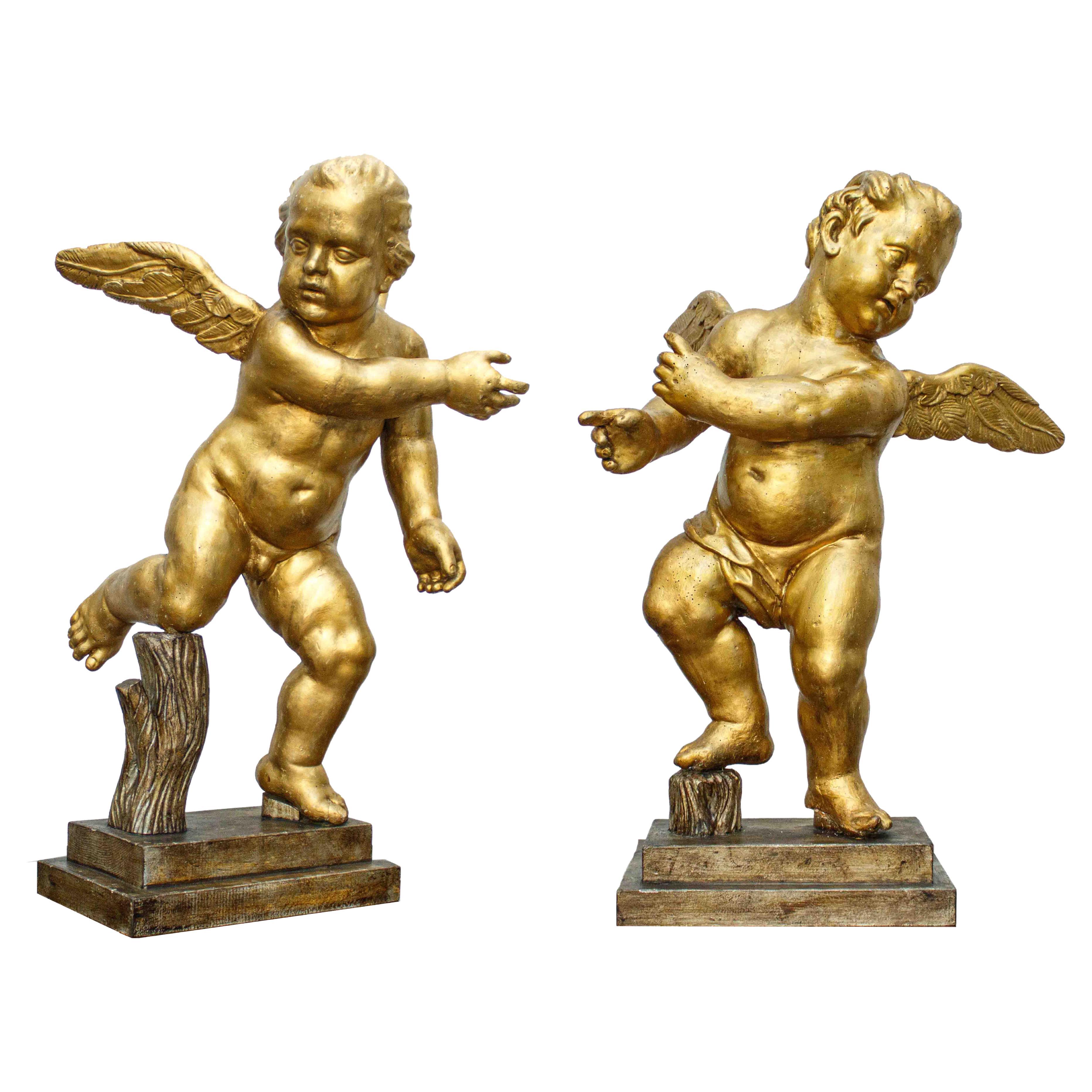 Pair of angels in gilded wood Rome 17th century For Sale