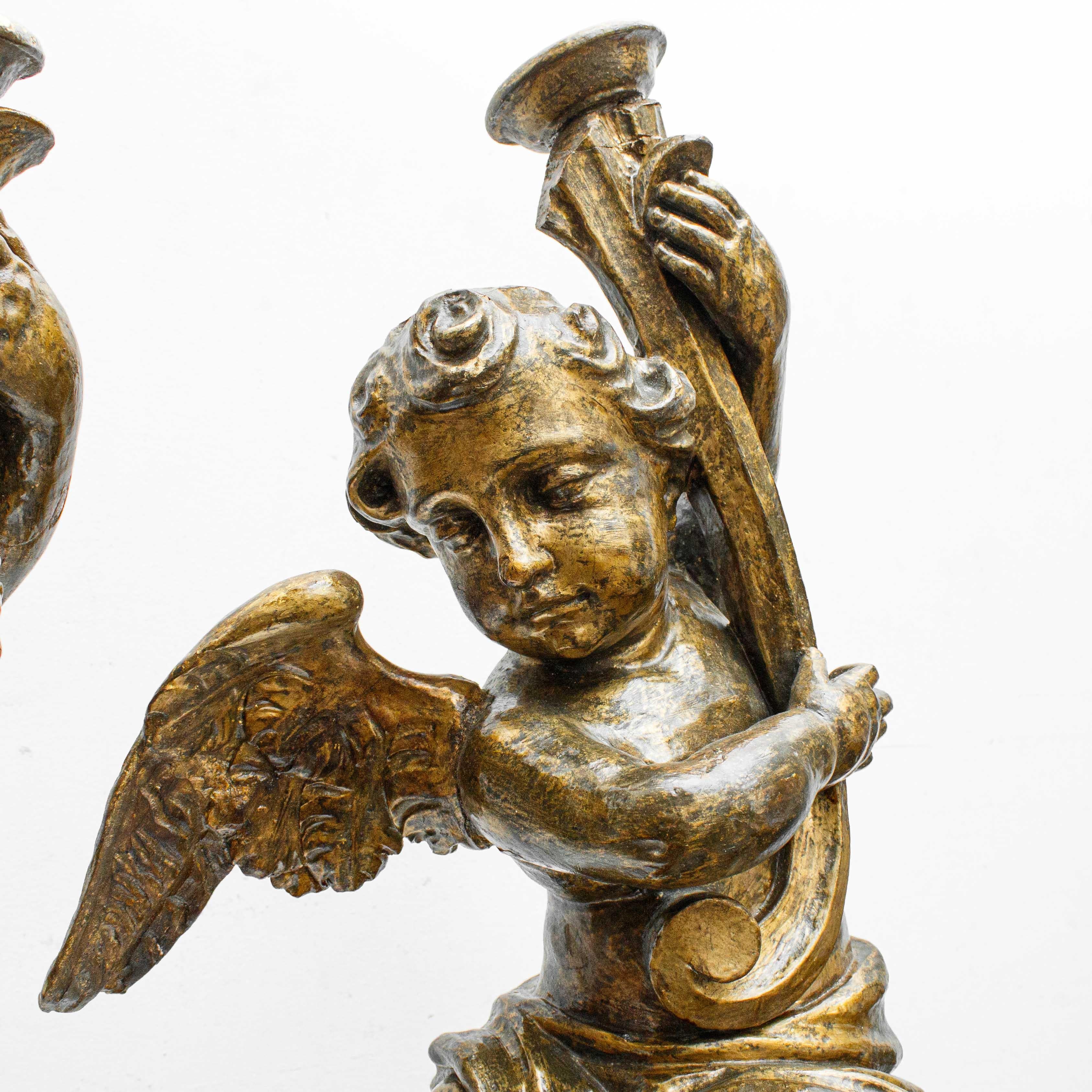 18th Century and Earlier Pair of candle-bearing angels, Carved and gilded wood, 18th century For Sale