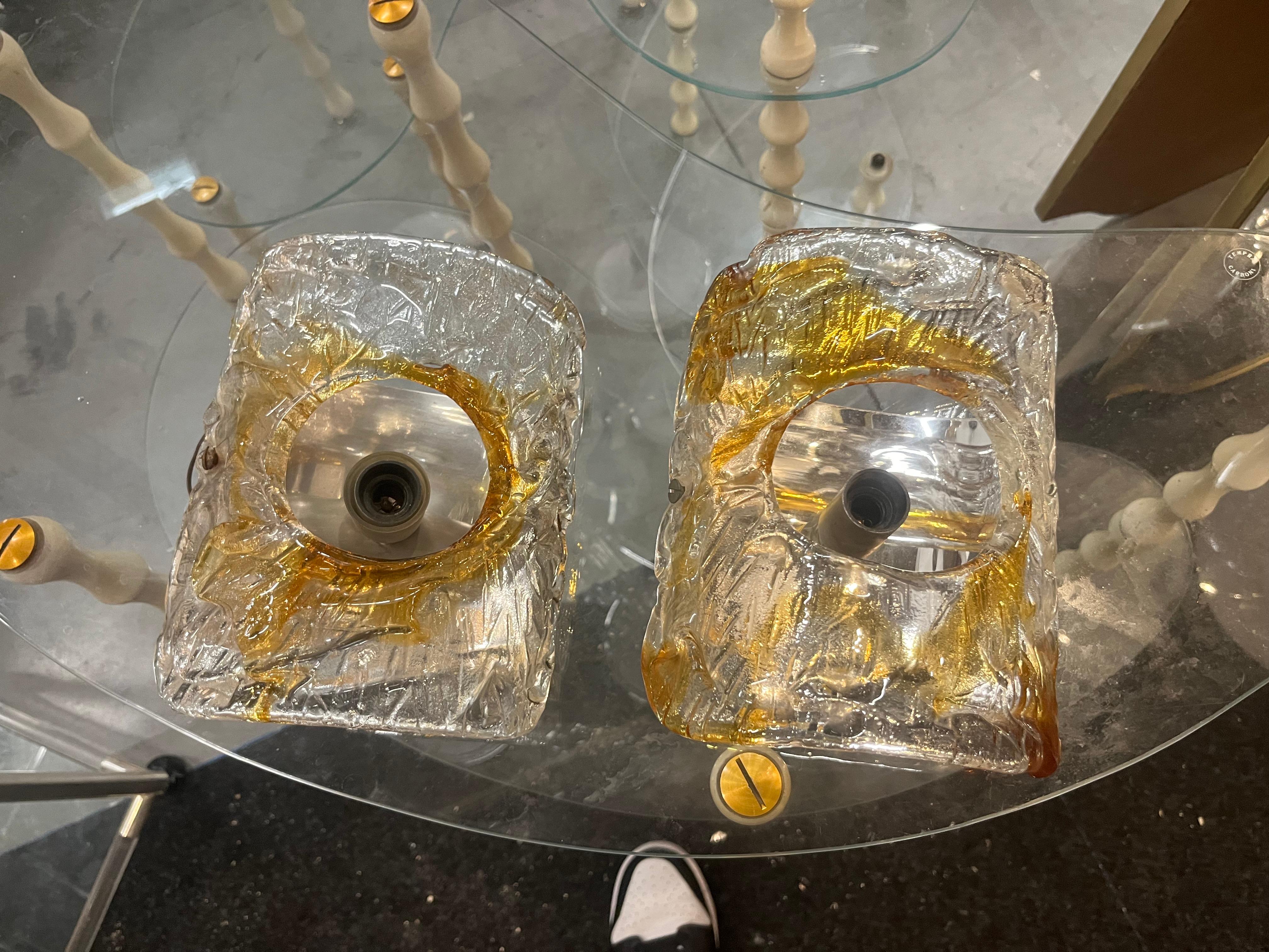 Pair of 50s/60s Murano glass wall sconces in the style of Mazzega
in excellent condition, showing no defects or chipping.
Measures:
Length 18 cm
Width  14 Cms