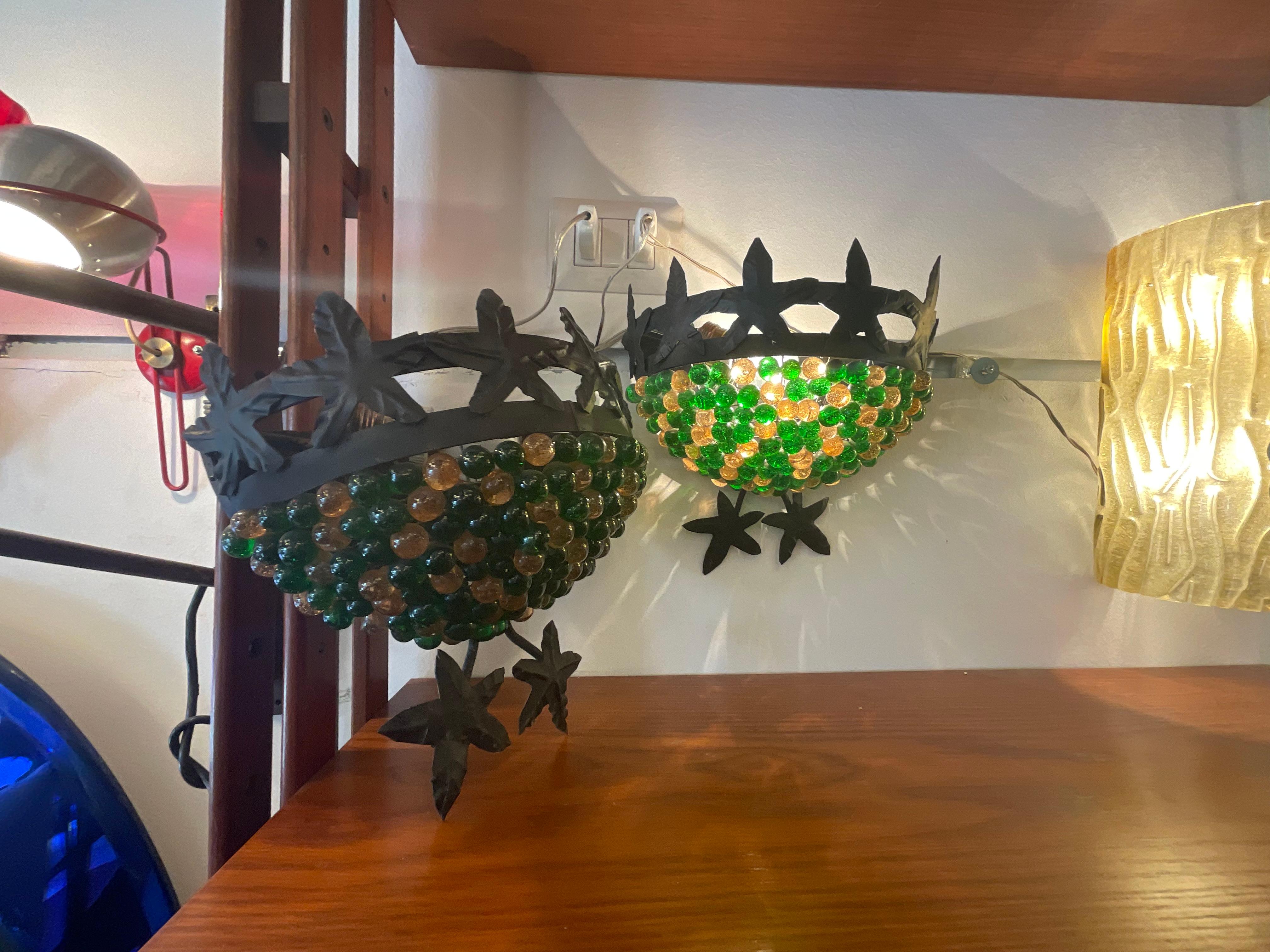 Mid-Century moderno Coppia di appliques in vetro di murano e ferro battuto in vendita