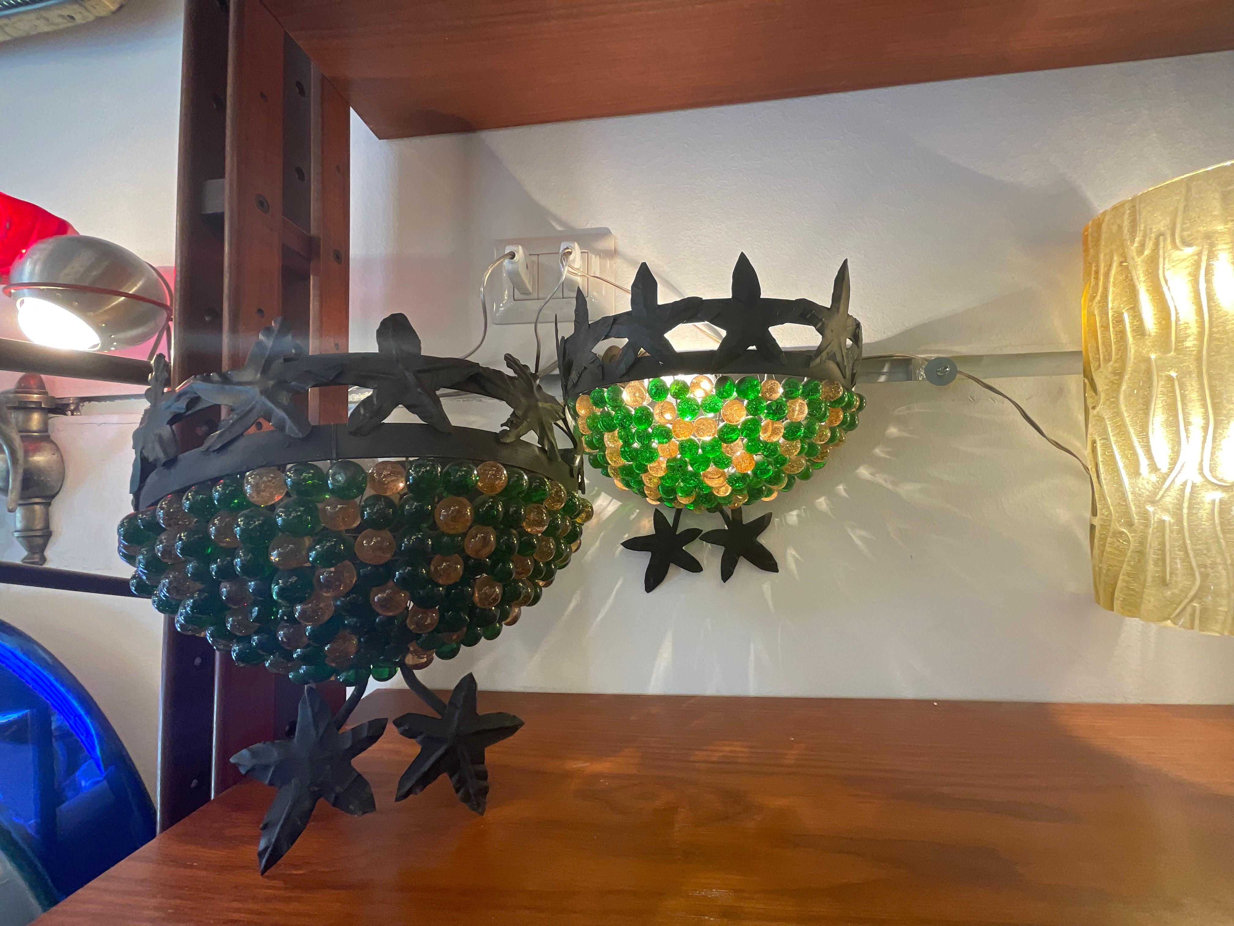 Coppia di appliques in vetro di murano e ferro battuto In condizioni buone in vendita a Milano, IT