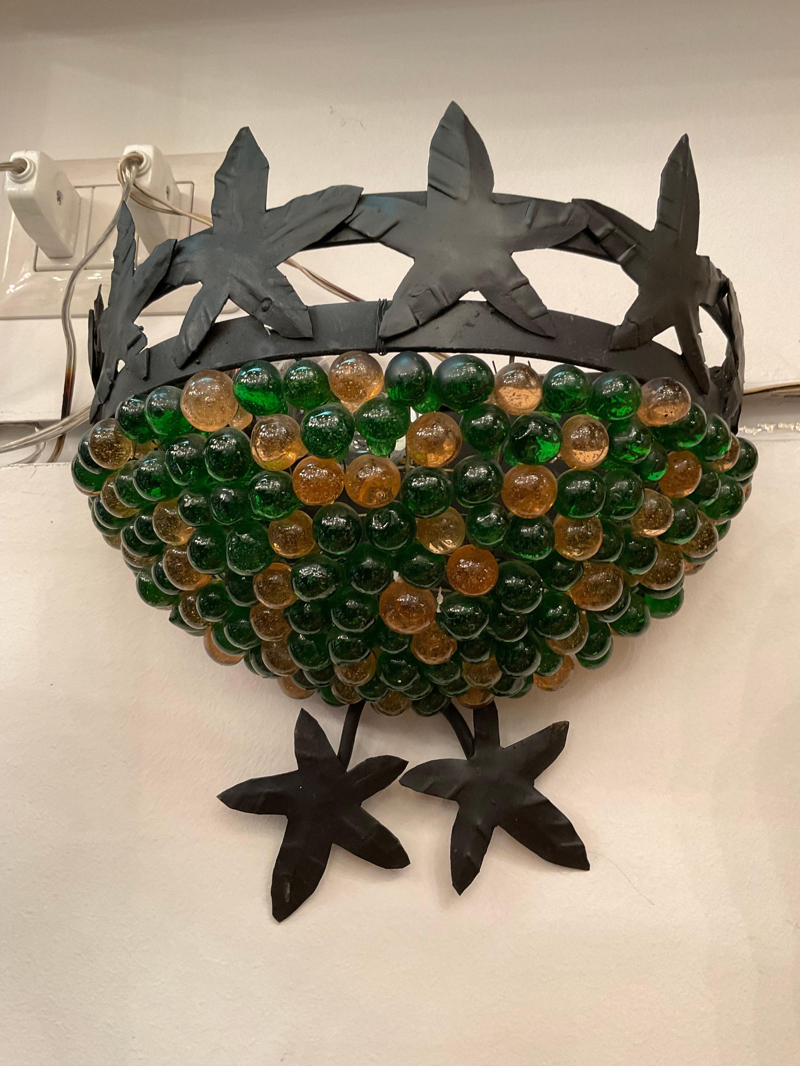 Coppia di appliques in vetro di murano e ferro battuto in vendita 1