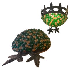 Pair of murano glass and wrought iron wall sconces