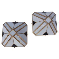 Pair of modern pyramid-shaped opal glass wall sconces, Italy, 1970s