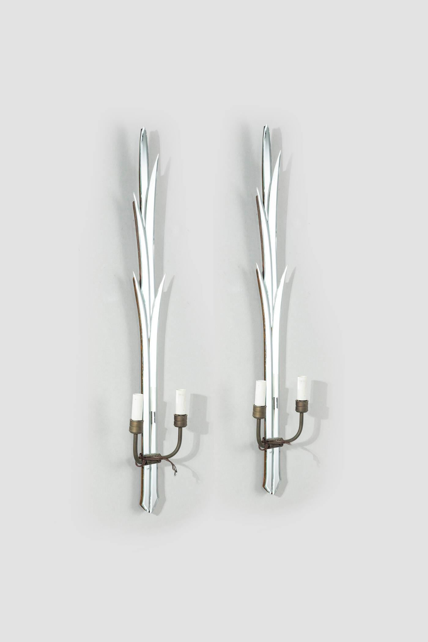 Pair of Italian wall sconces, 1940s. Wooden frame and mirrored glass surface

