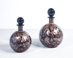 Pair of bottles with blown glass stoppers signed Carlo MORETTI. 1970s