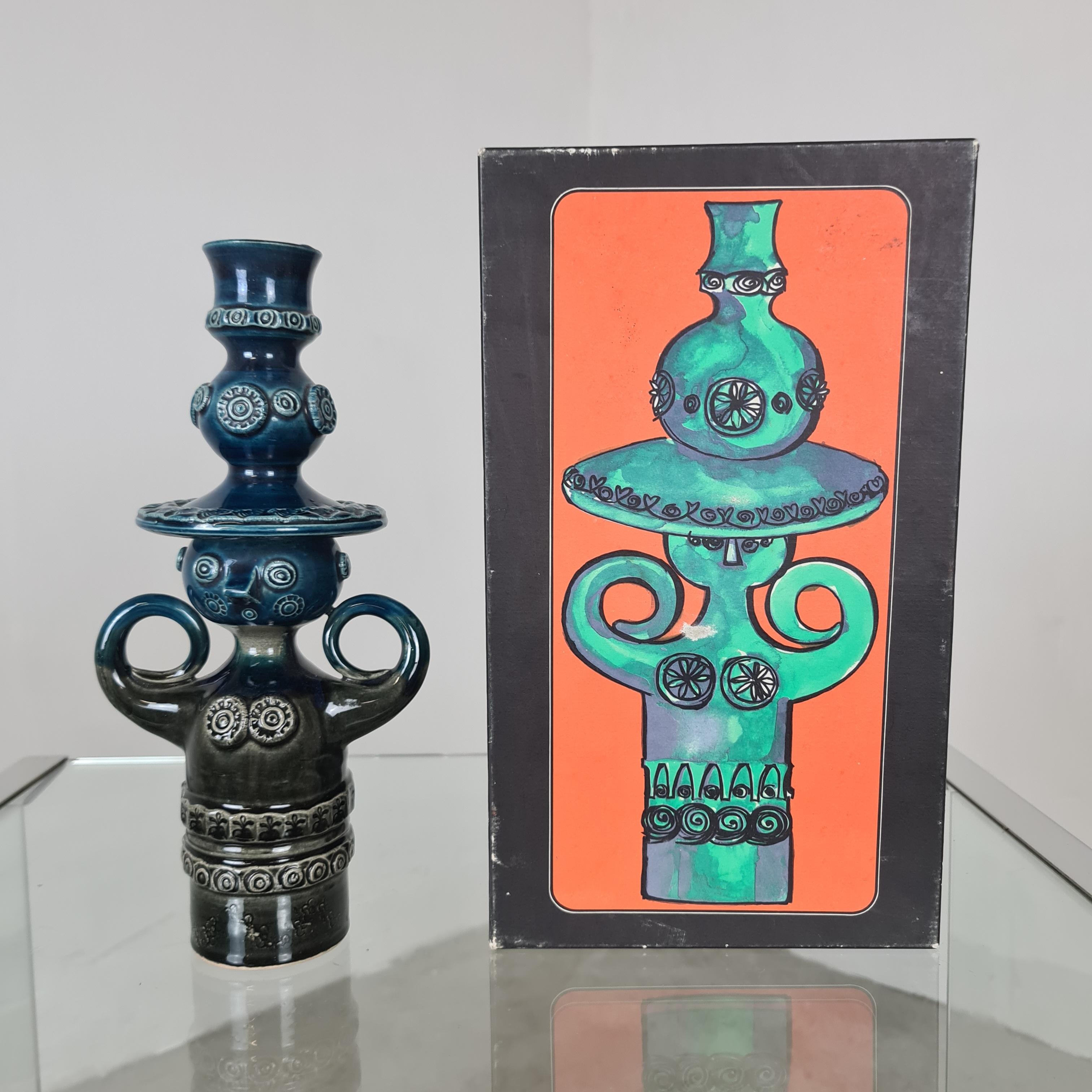 Pair of Candelabra by Bjorn Wiinblad for Rosenthal Studio-Line.

Fairy-tale pair of hand-glazed polychrome ceramic candlesticks in the shape of characters, man and woman, in the typical Danish designer's style.

Shades ranging from greenish khaki to