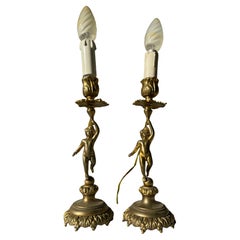 Coppia di candeliere putti francese in bronzo anni '80 con due faretti
