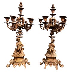 Pair of finely chiseled gilt bronze candlesticks, Italy