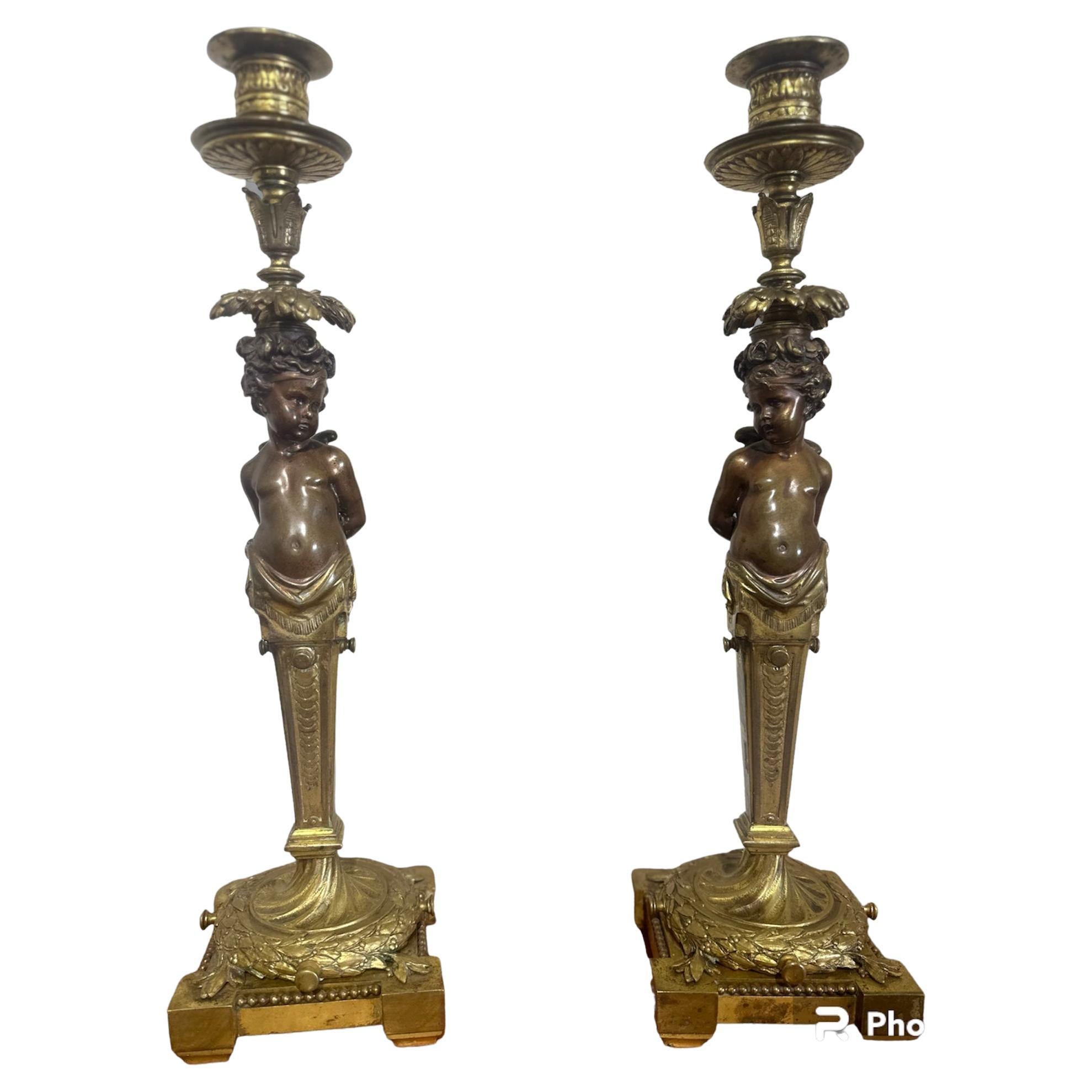 Coppia di candelieri in bronzo 