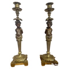 Coppia di candelieri in bronzo 