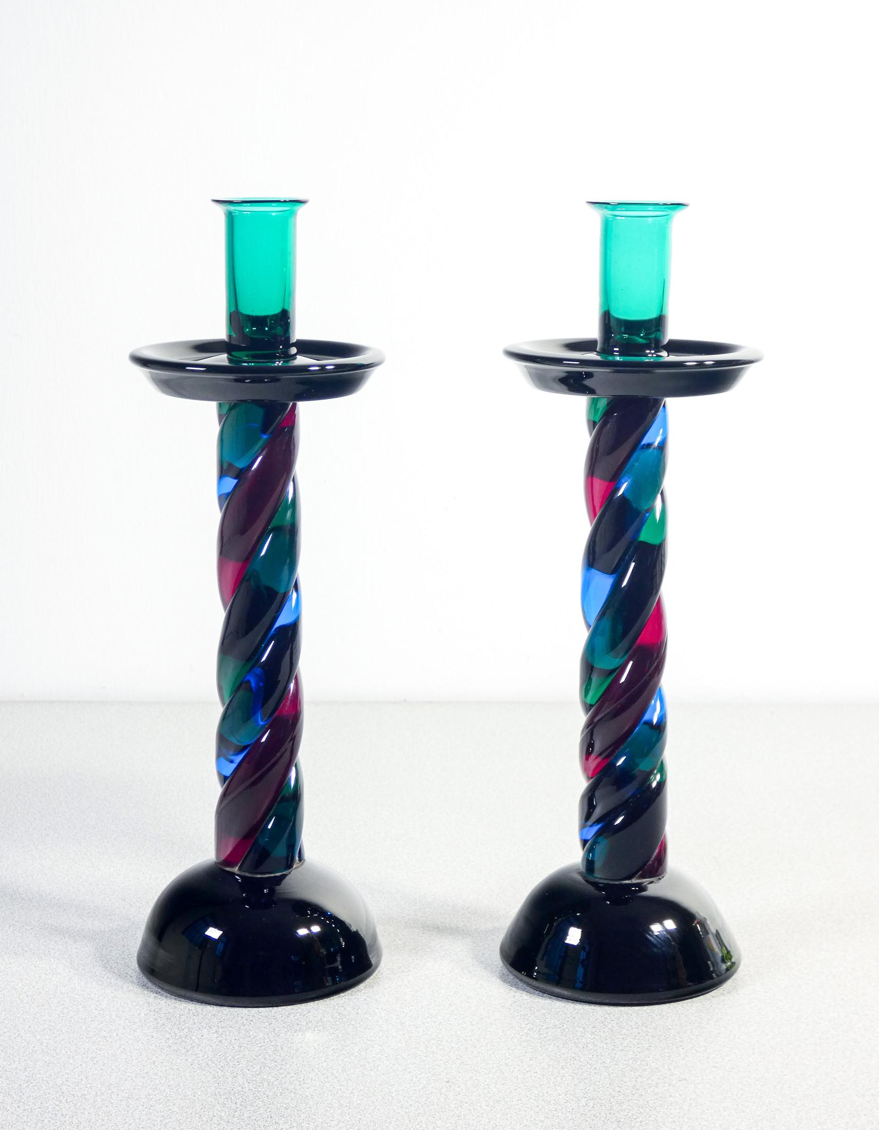 Pair of candlesticks
blown glass
murano polychrome.

ORIGIN
Italy

PERIOD
Mid-twentieth century

MARK
Murano Manufacture

MODEL
Pair of candlesticks

MATERIALS
Polychrome blown glass

DIMENSIONS
H 32 cm

CONDITIONS
Perfette. Evaluate through the