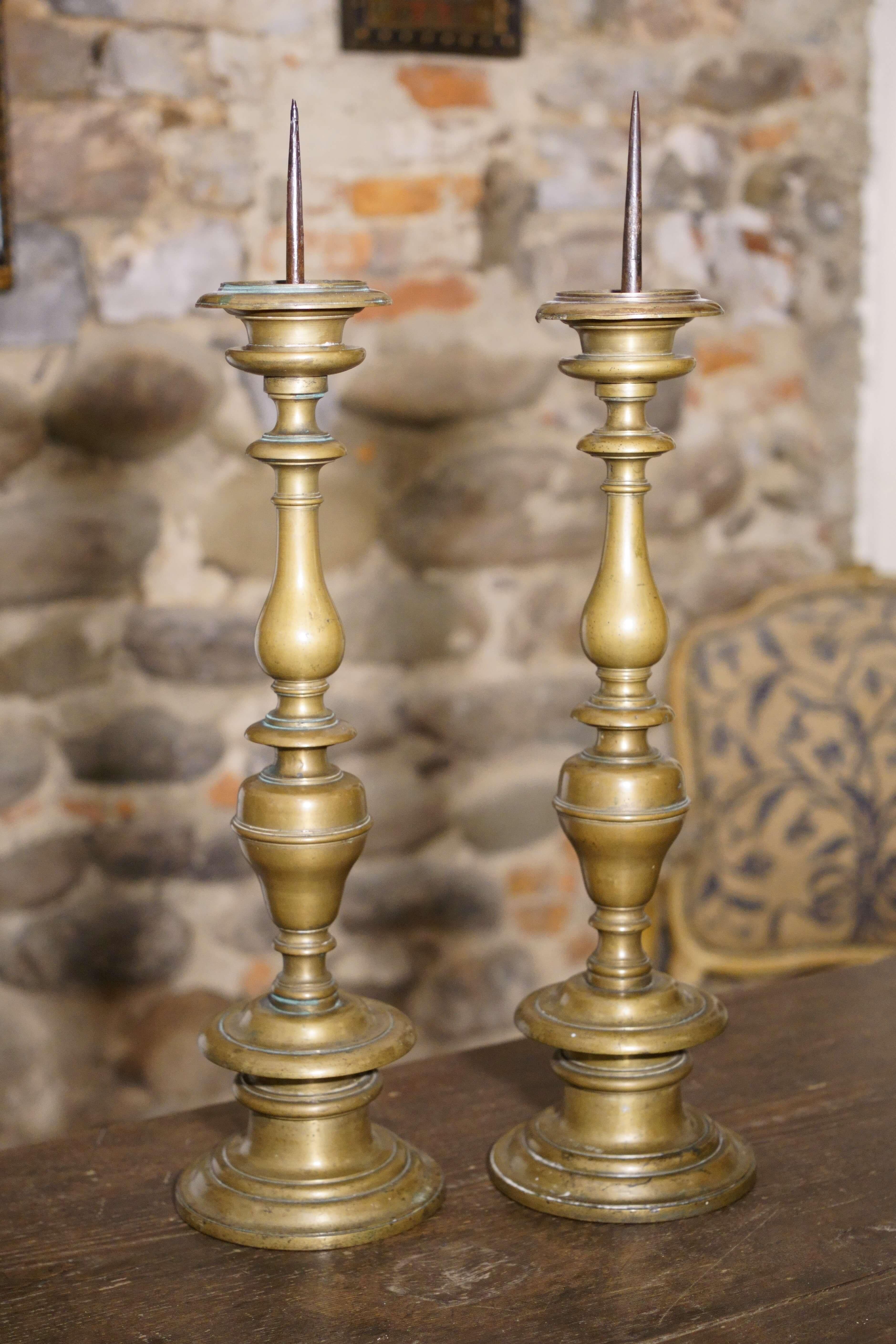 Rare pair of large bronze candelabra engraved with the inscription: Sebasus Brandius 1644 (Sebastian Brandi 1644).  These are the so-called 
