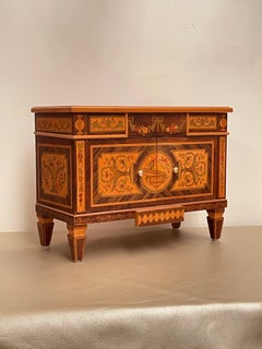 PAIR OF WALL-PLATED DRAWERS IN VARIOUS WOODS, 1970s